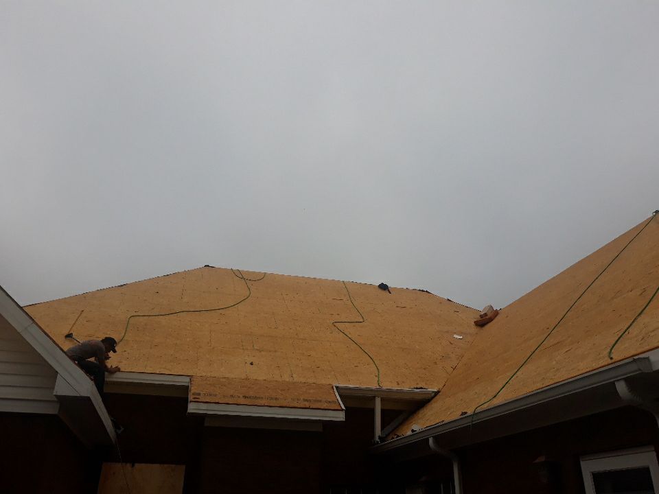 Residential Roofing Installation using Roof Replacement by American Roofing & Construction LLC