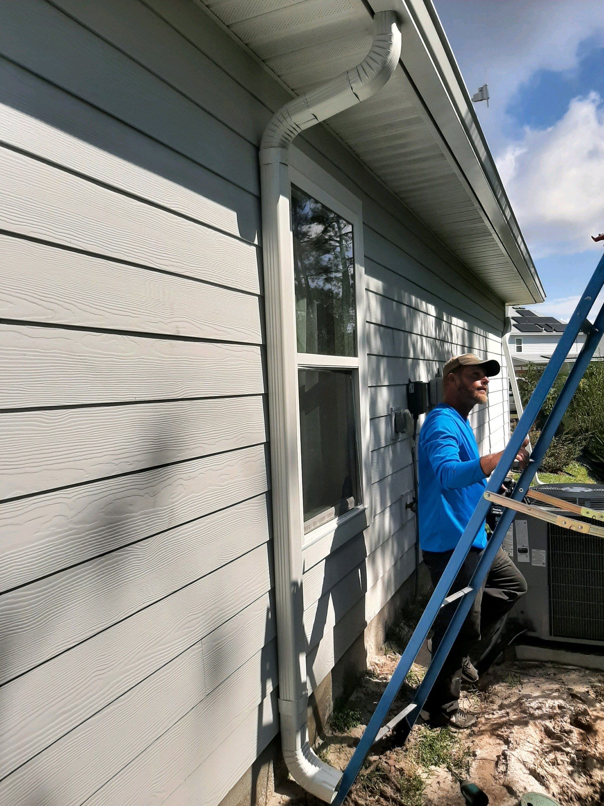Seamless Gutter Installation using White by Gutter Professors