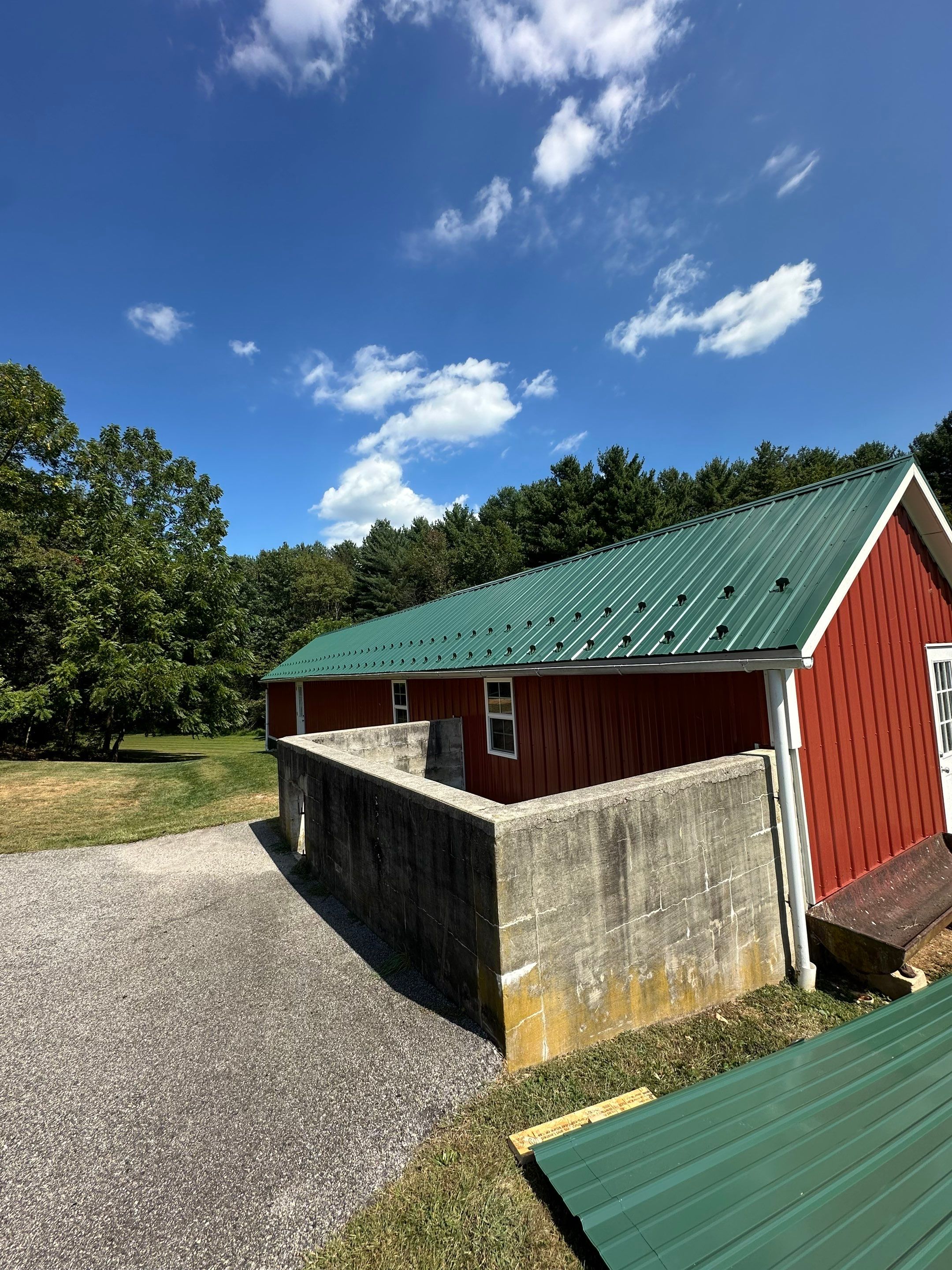 Stunning Metal Roof Transformation on a Classic Red Barn in New Freedom, PA by Bealing Roofing & Exteriors