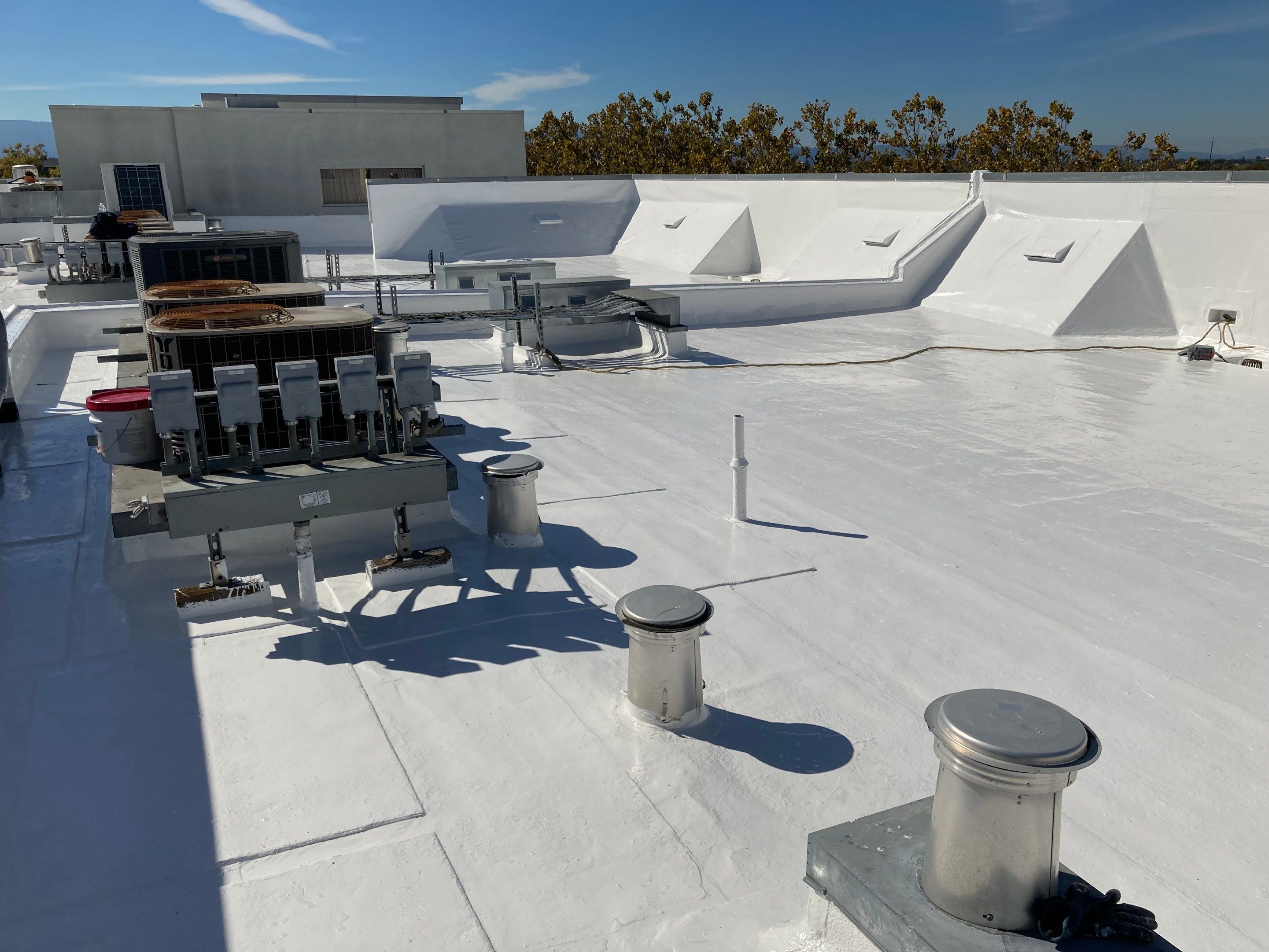 Commercial Flat Roof Repair and Reflective Silicon Coating in San Jose by Eastman Roofing & Waterproofing Inc.