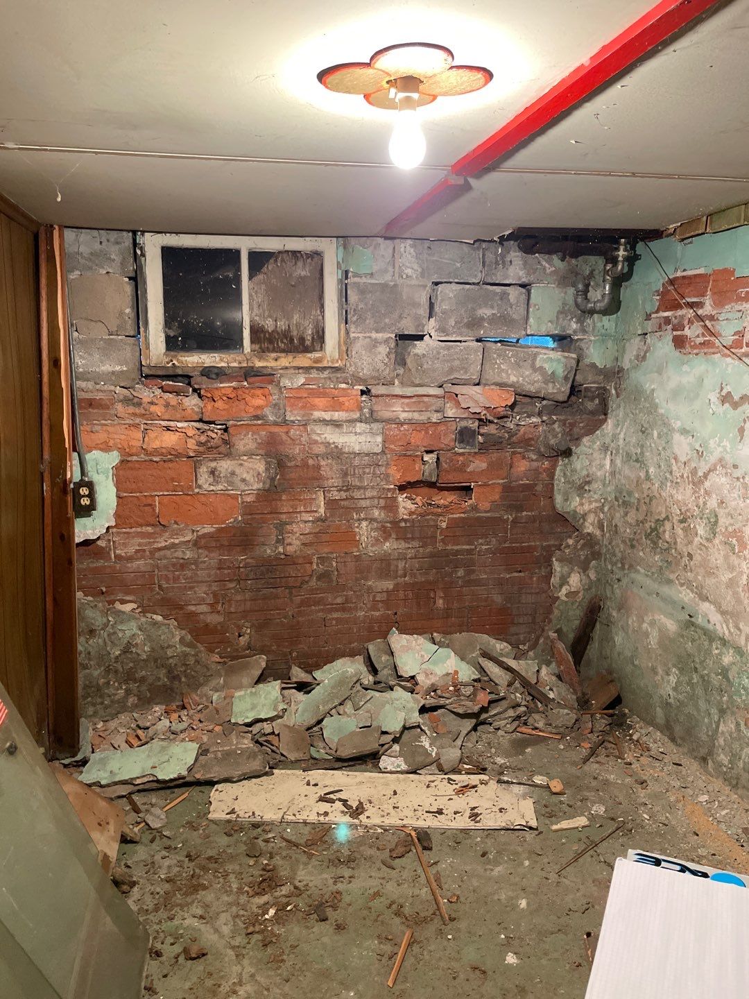 Wall repair with Fortress Invisibeams by ACE Waterproofing & Basement Solutions