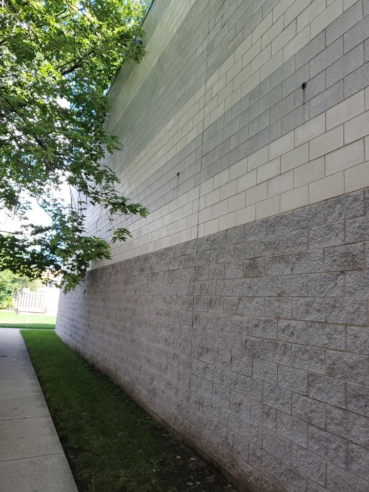 commercial pressure washing using Algaecide, soft wash soap by Northern Power Washing LLC.