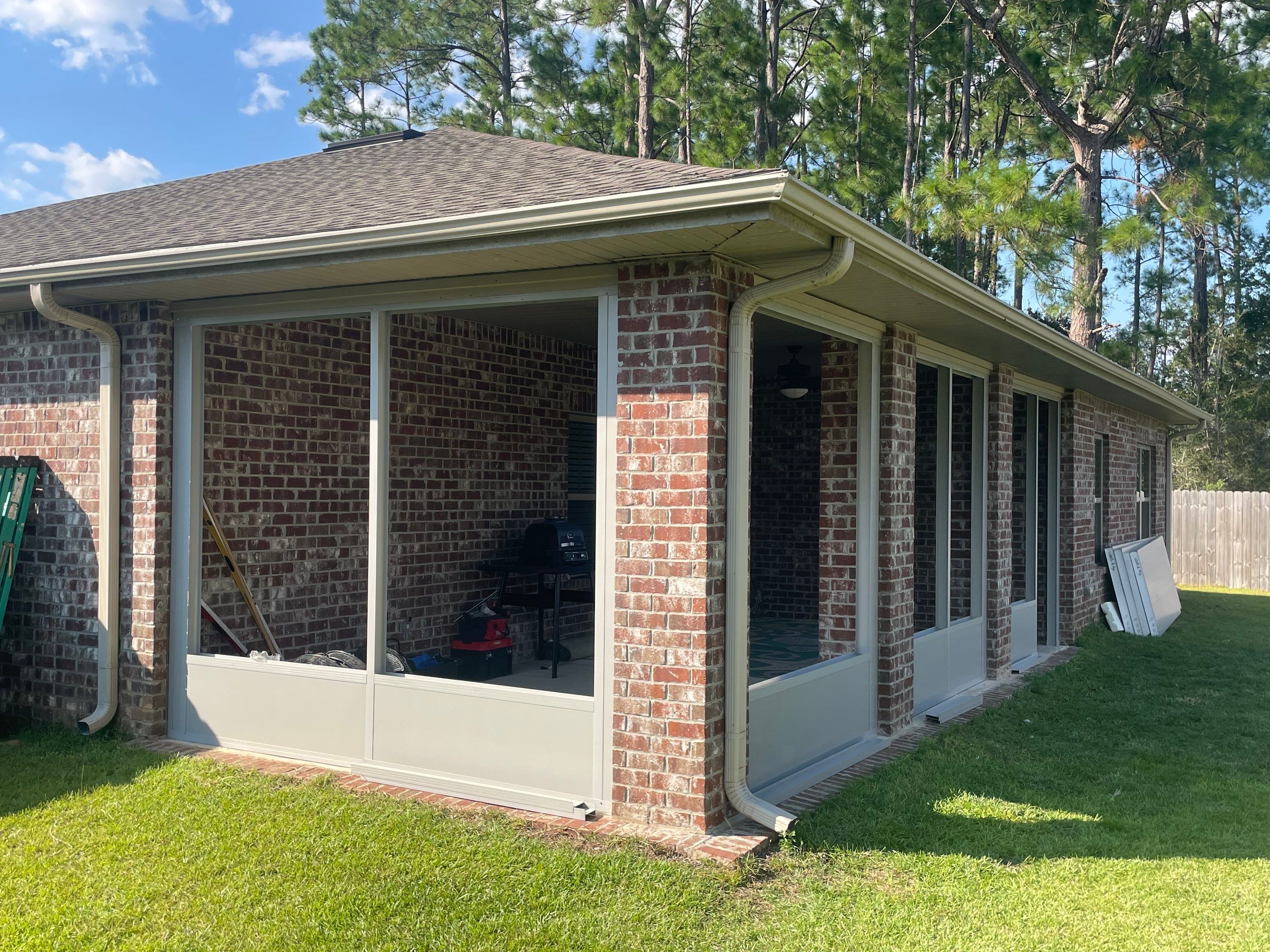 Glass Room Under Existing Patio Cover by Titan Sunrooms