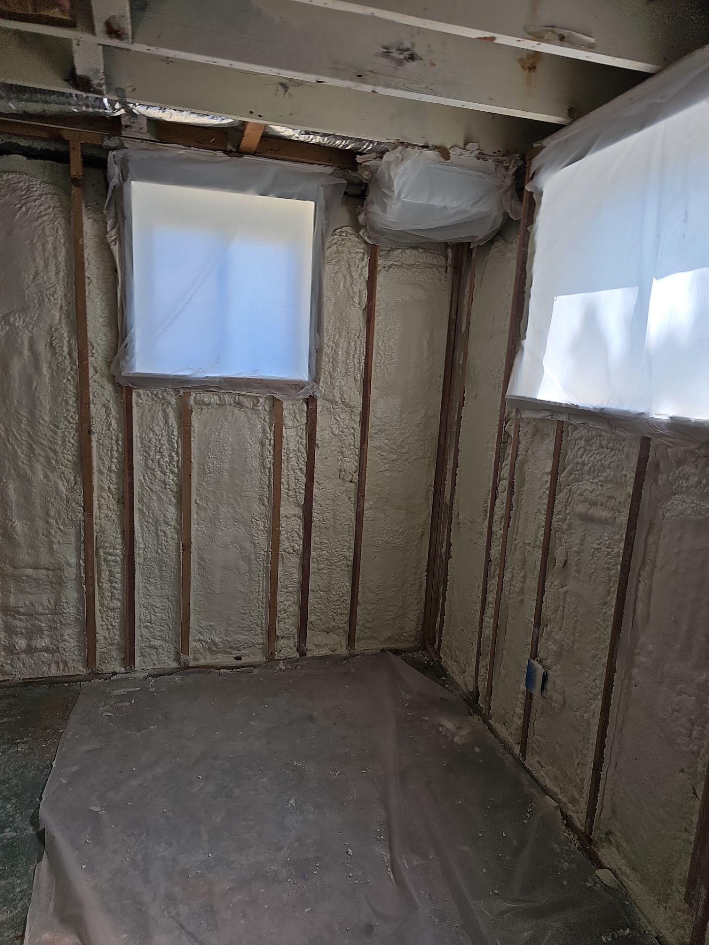 Basement Exterior Walls using Closed Cell Spray Foam by NYS Foam & Energy