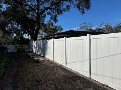 Vinyl Fence Installation using 6Ft White Vinyl Fence with a 4Ft White Picket Fence