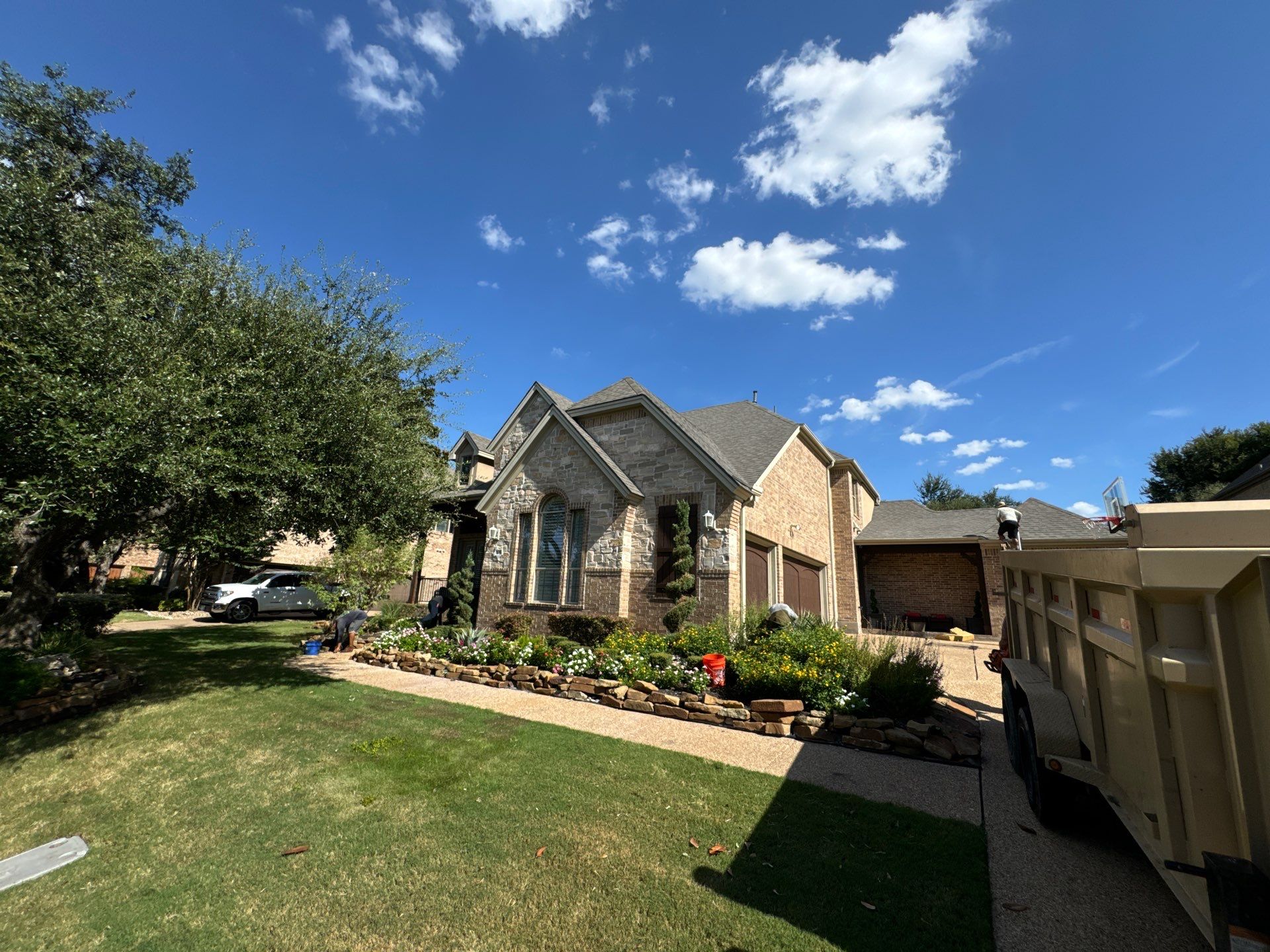 Residential Roofing Installation using IKO, Cambridge in Weathered Wood by Oakwood Roofing and Construction, LLC