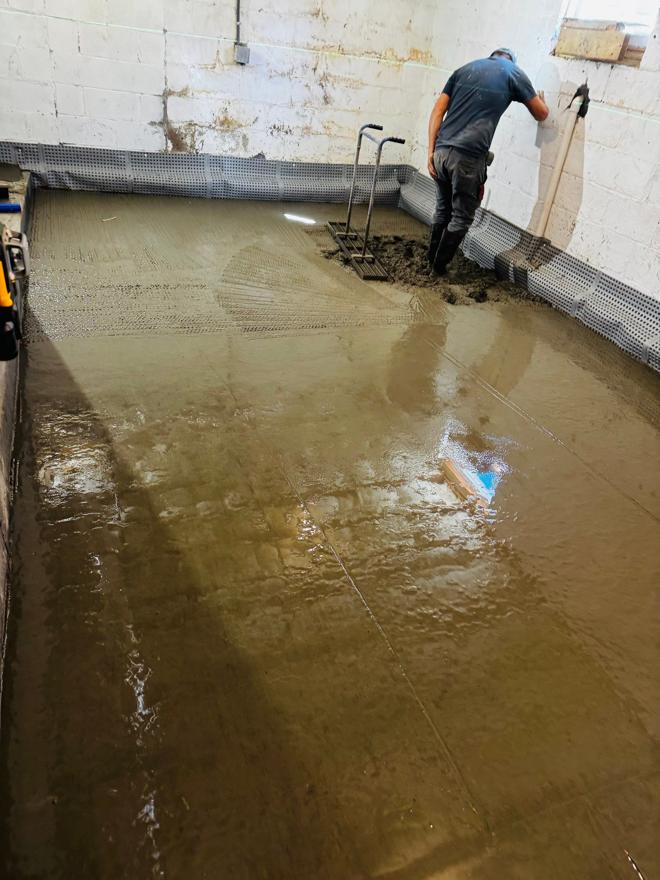 Concrete Floor Replacement and Interior French Drain Project in Morris Plains, New Jersey by Pure Service Pro, LLC 