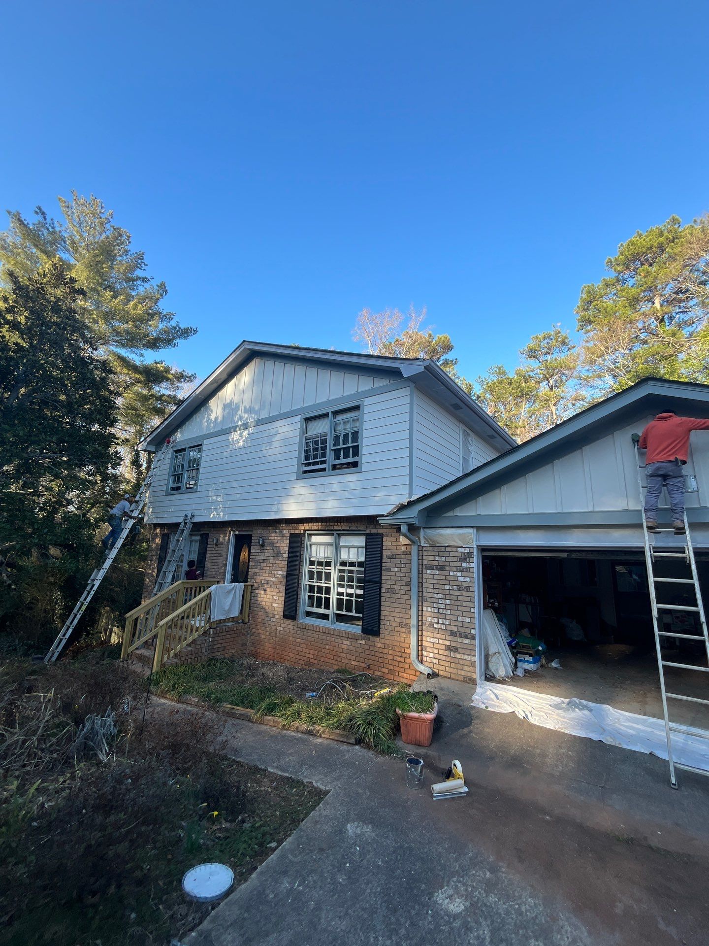 Board and Batten Siding Installation and Railing Replacement in Lilburn, GA by Nelson Exteriors 