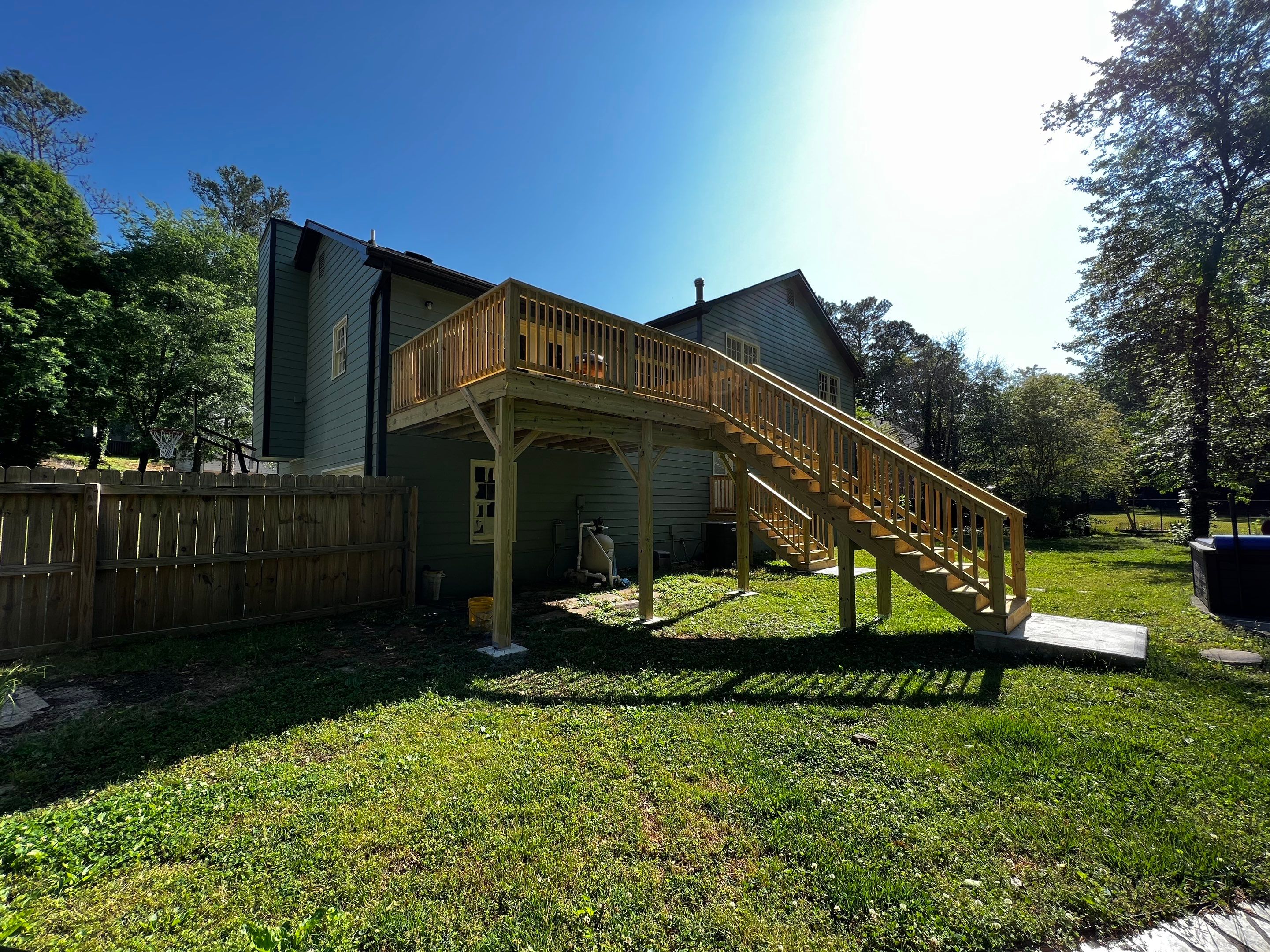 Elevated Pressure-Treated Wood Deck Replacement in Marietta by Swift Home Renovations