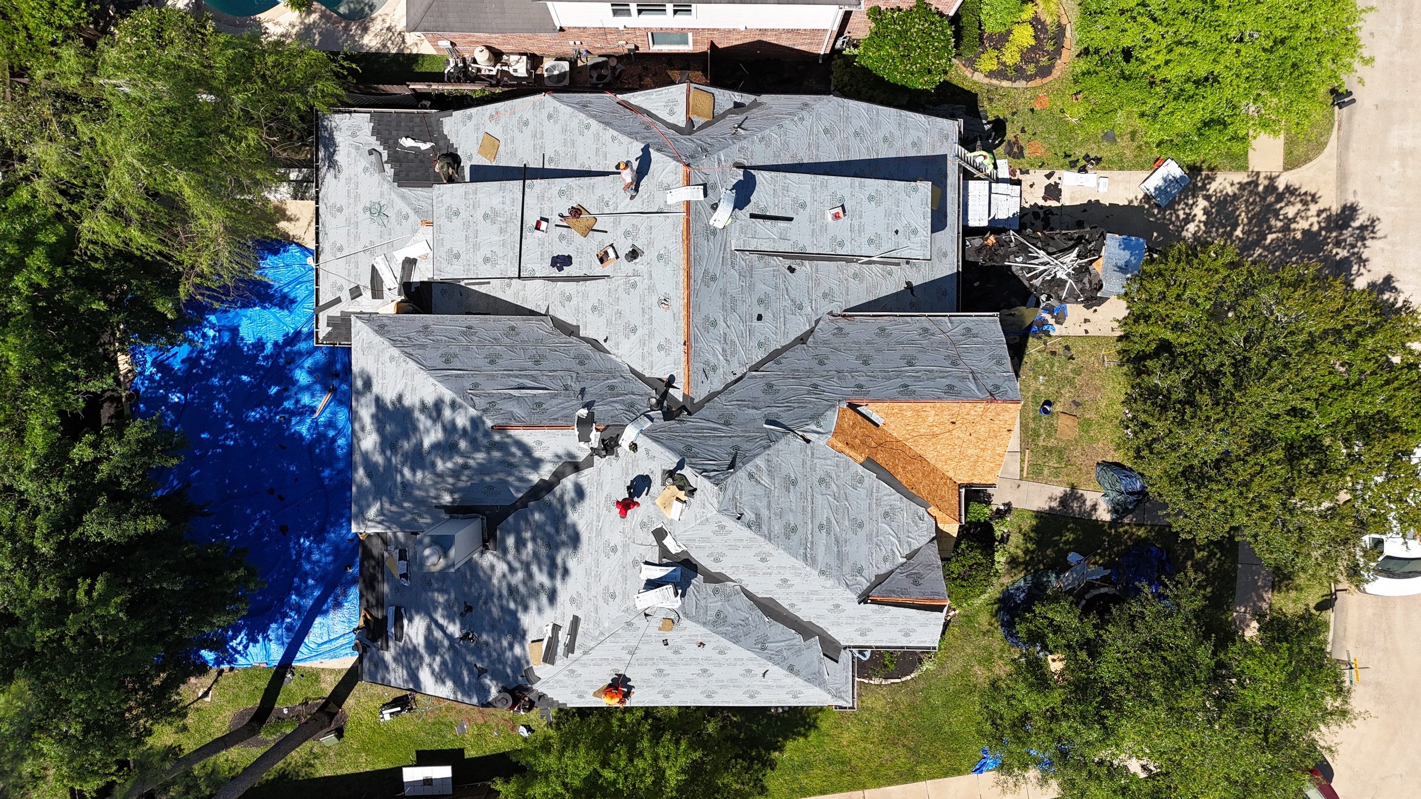 Residential Roofing Installation using Architectural Shingles by Core Four Roofing