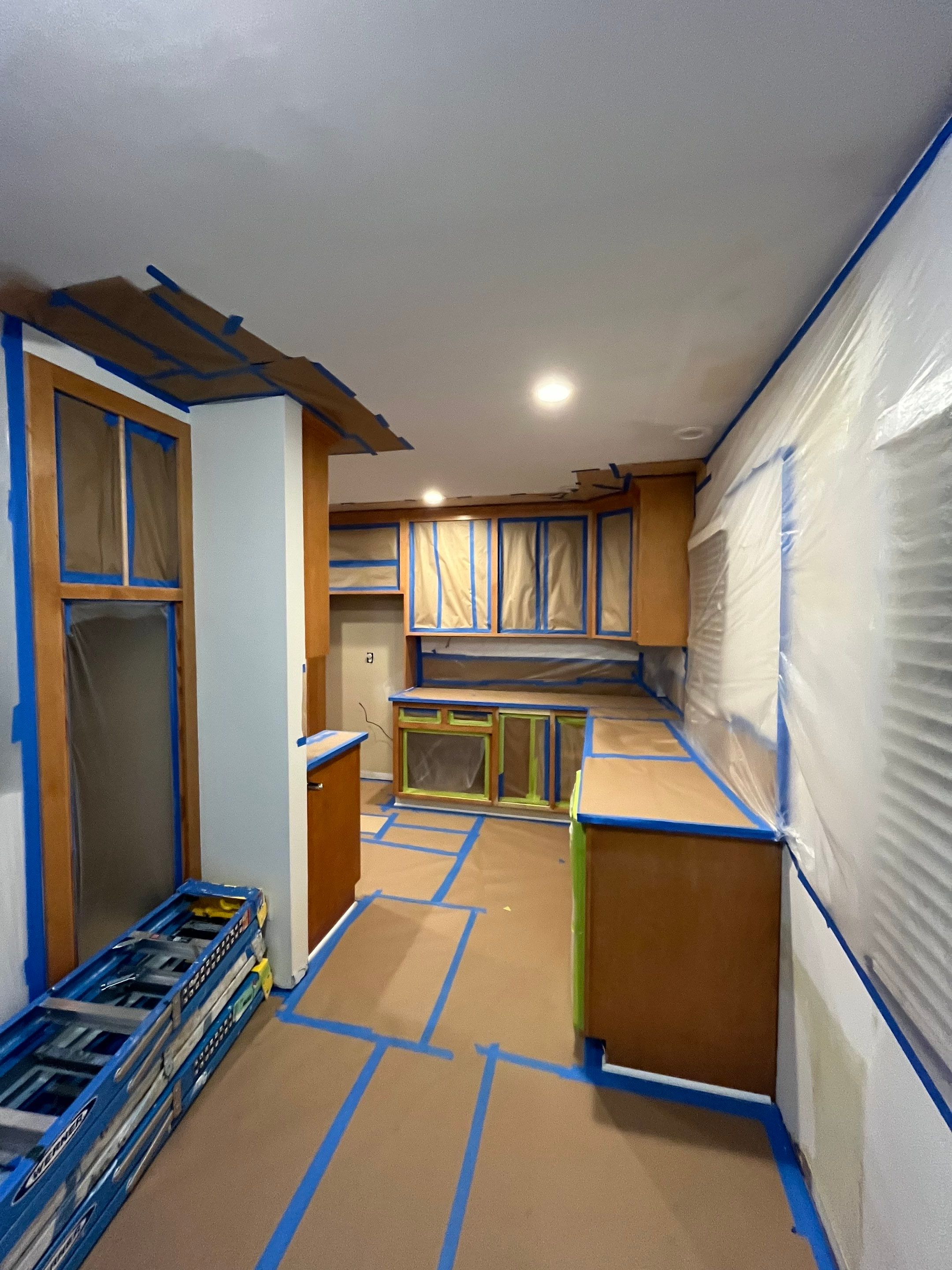 Elegant Transformation: Stained Cabinets Revamped with Sherwin-Williams Juniper by Cougar Painting