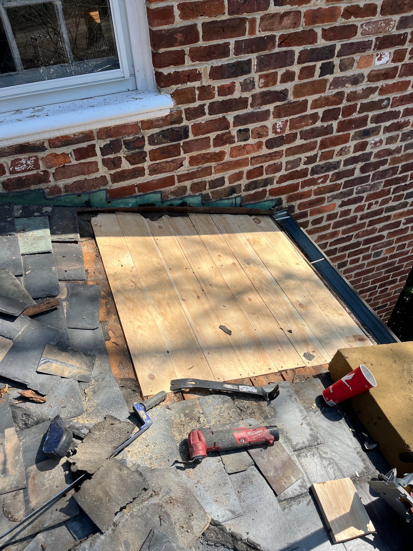 Slate Roof Restoration and Copper Ridge Cap Install in Richmond by Cade Construction