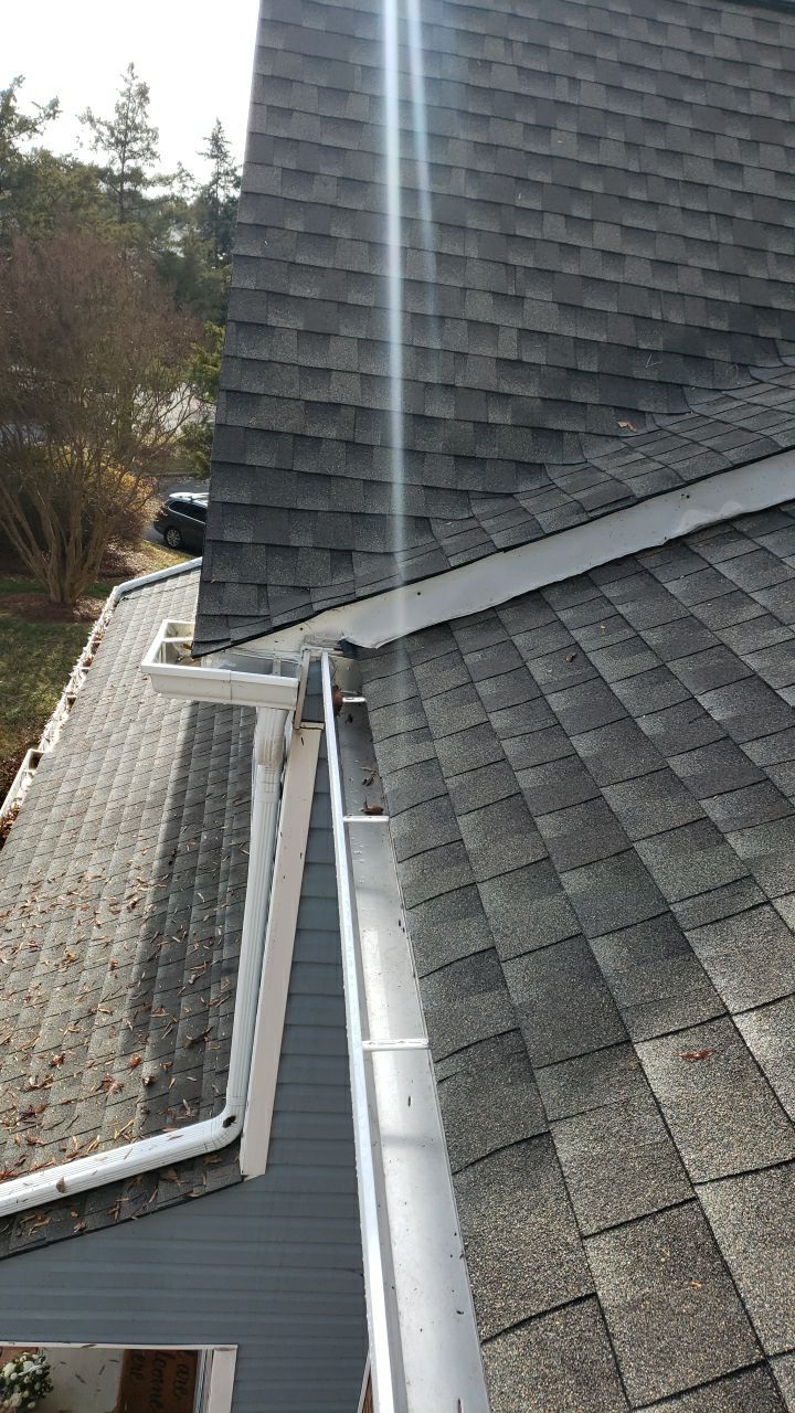 Gutter Cleaning using water by Power Wash Masters LLC