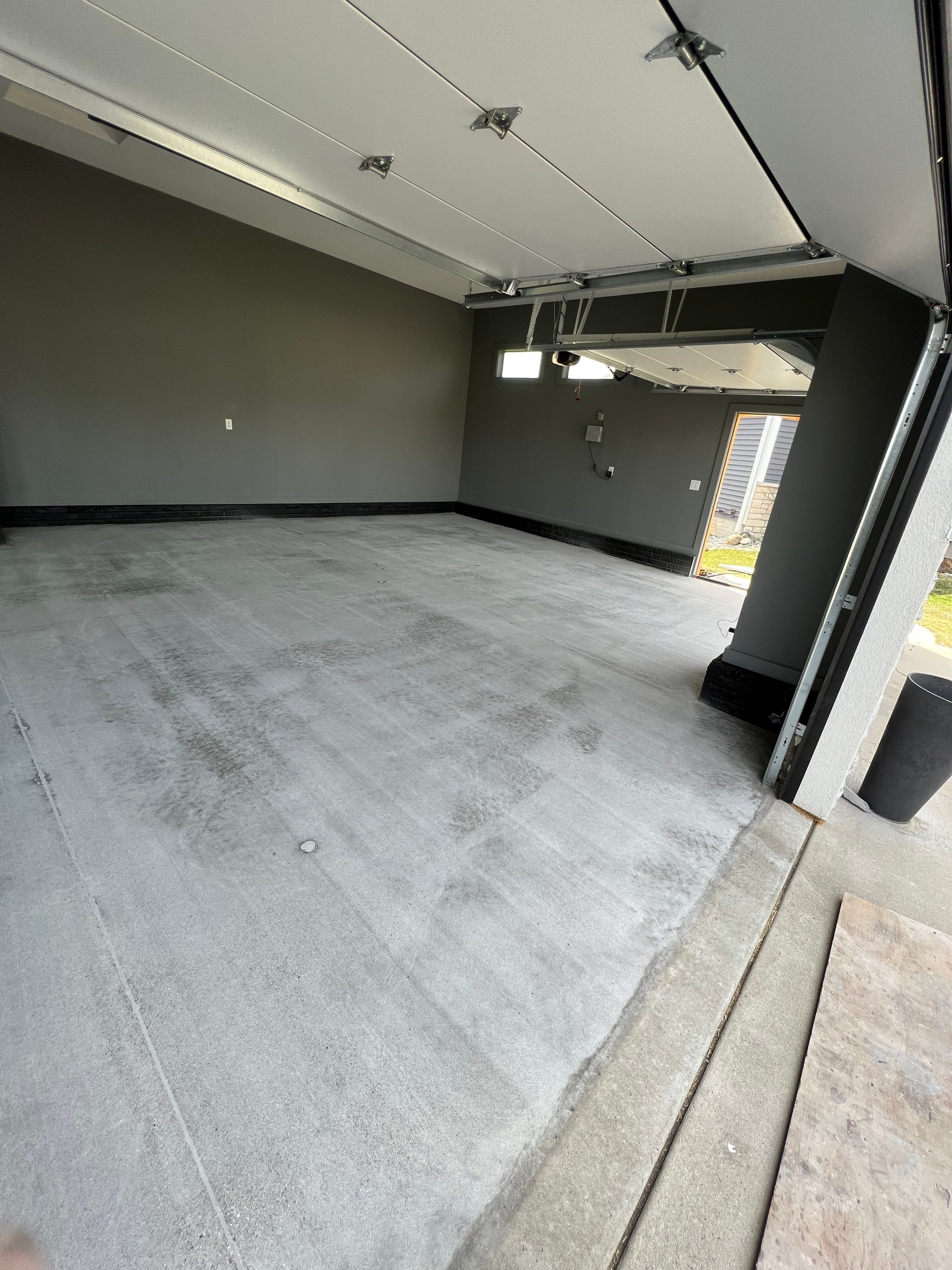 Garage painting and new floor by Cutting edge painting 