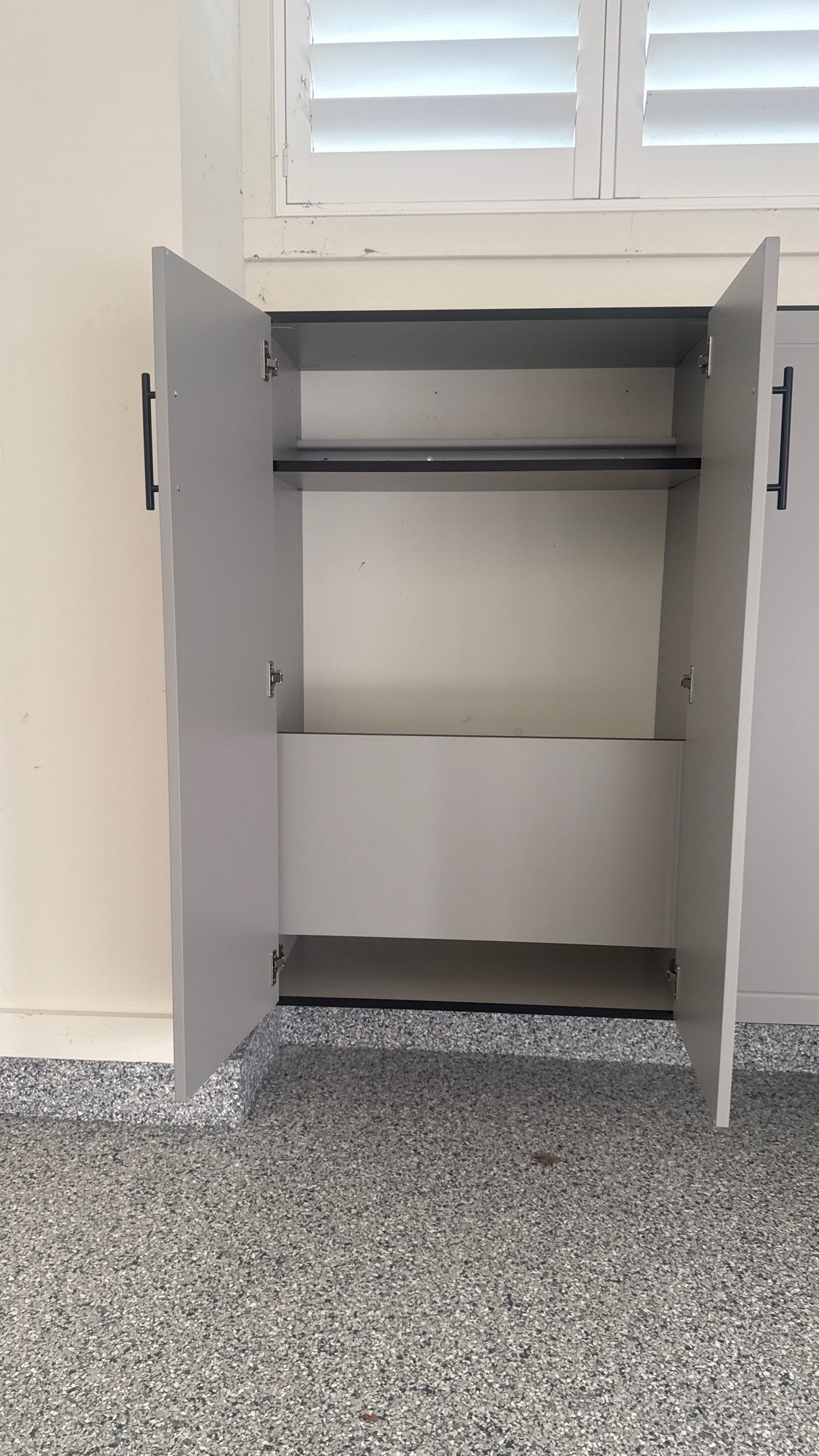 Nick's New Floor & Storage Looks Beautiful by Banner Garage