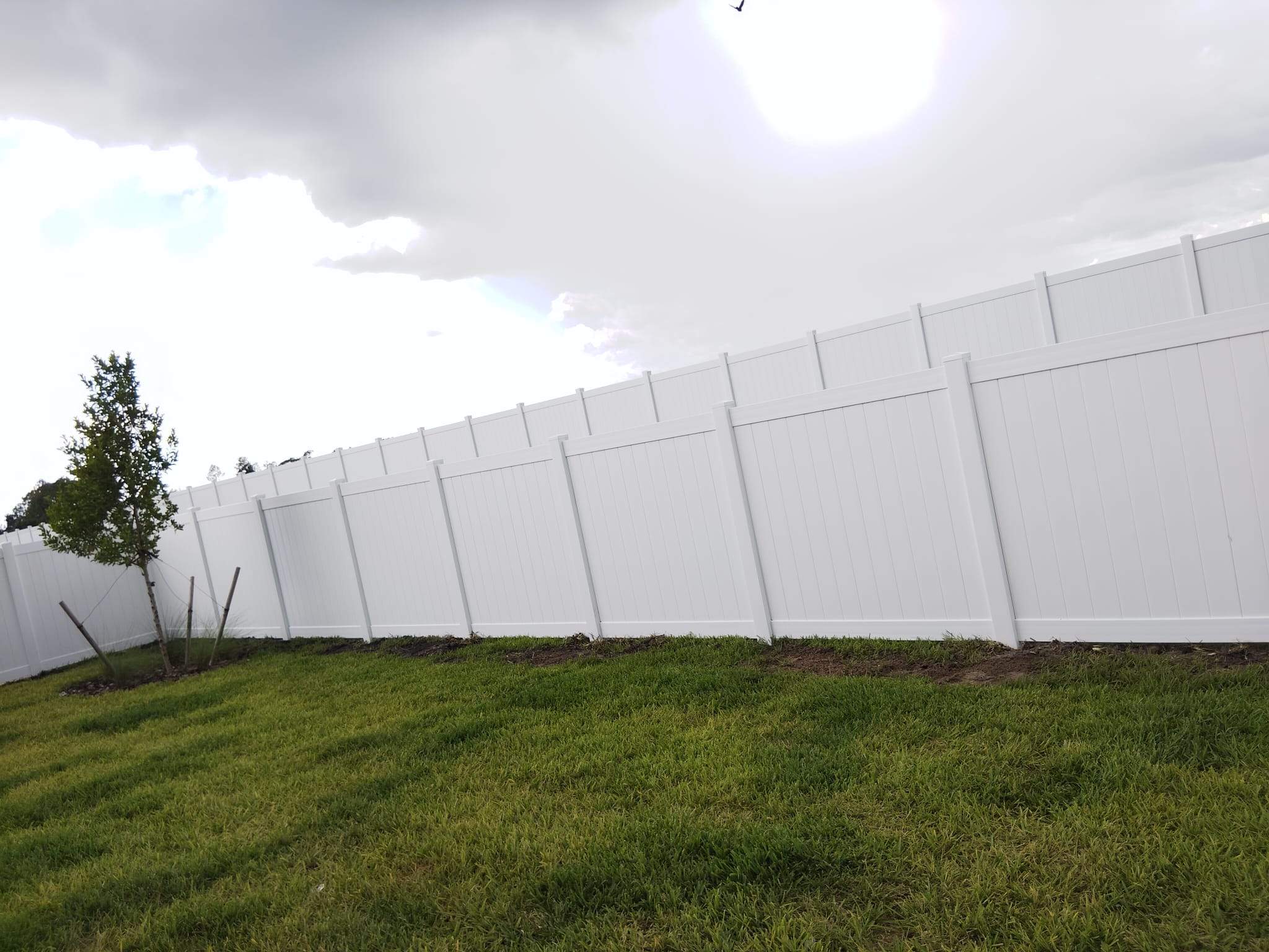 White Vinyl Privacy Fence Installation for North Port Residential Property by True Fence LLC
