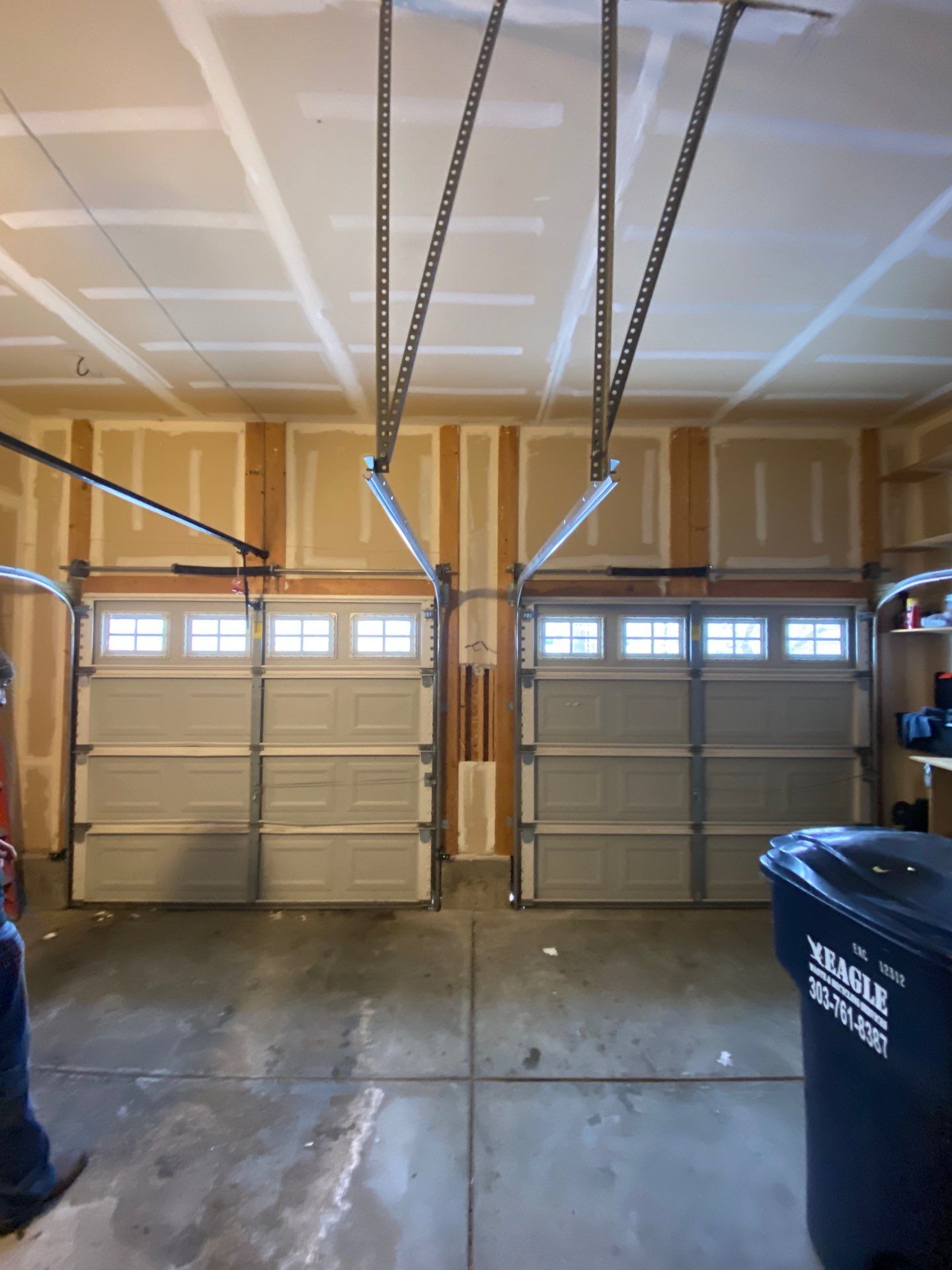 Garage door conversion by David & Goliath Contracting 