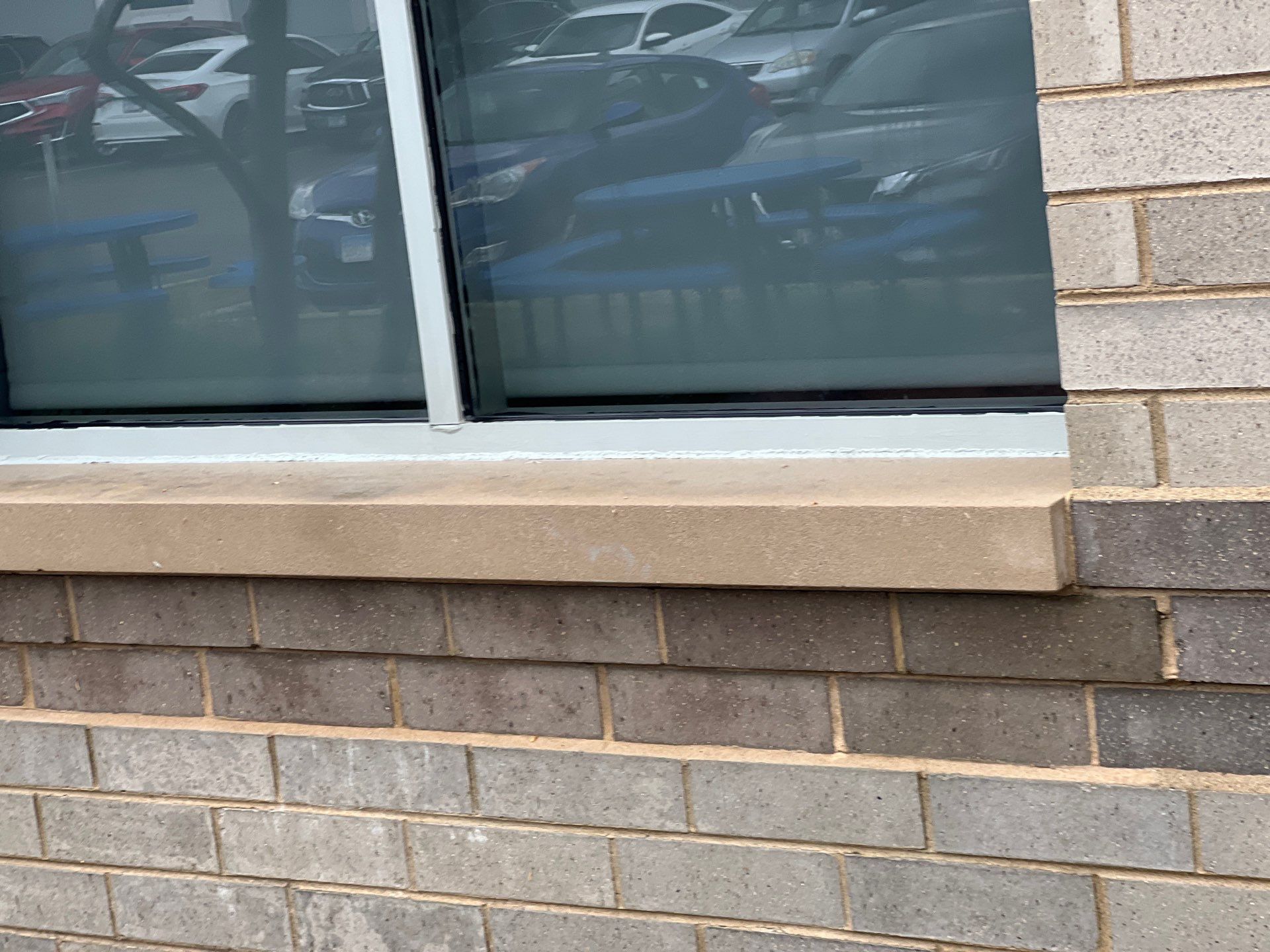 Commercial Facade cleaning using Algaecide, soft wash soap by Northern Power Washing LLC.