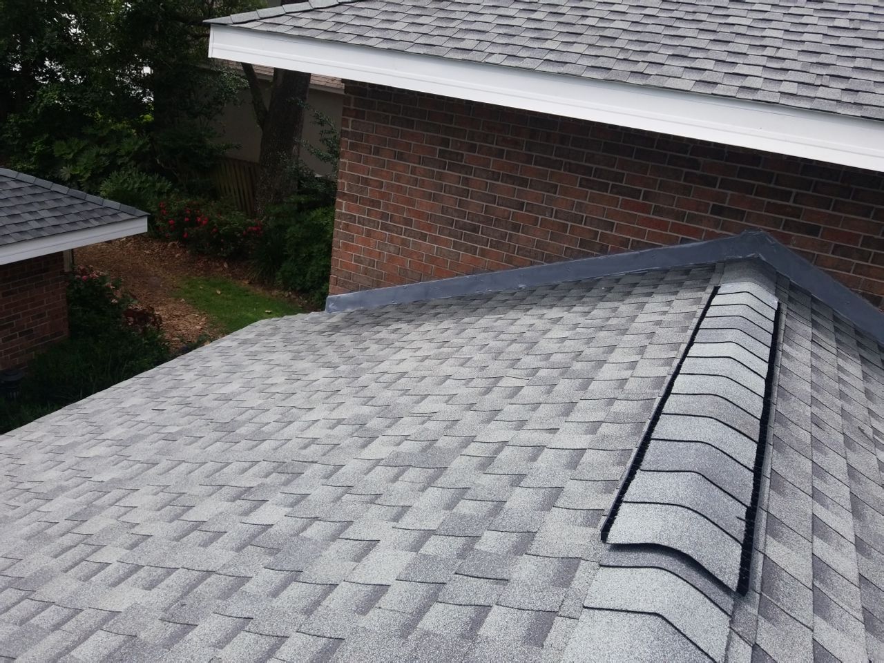 Residential Roofing Installation using Roof Replacement by American Roofing & Construction LLC