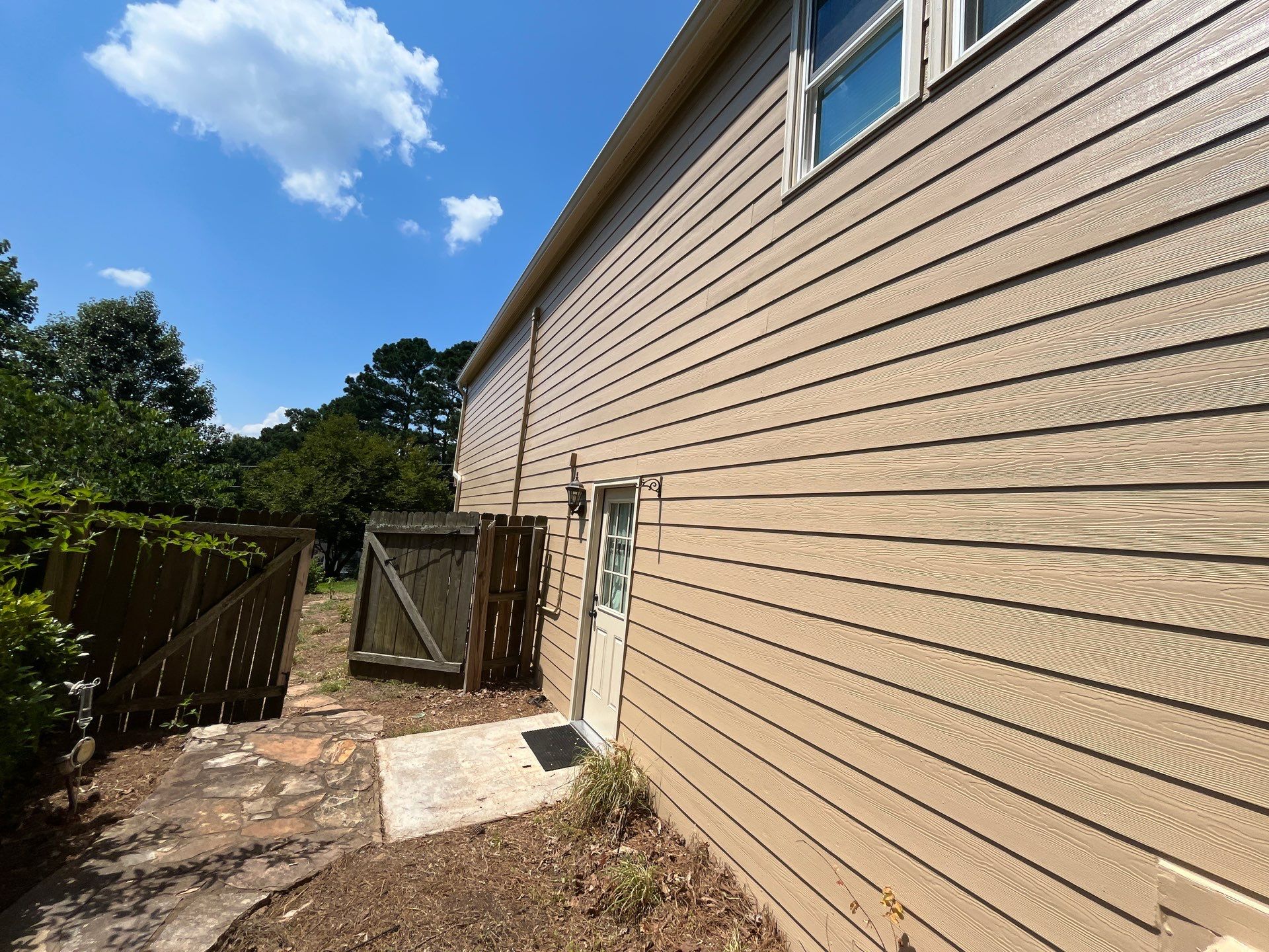 Rotted Wood Replacement, Deck Stain, and Exterior Paint Project in Kennesaw, GA by Nelson Exteriors 