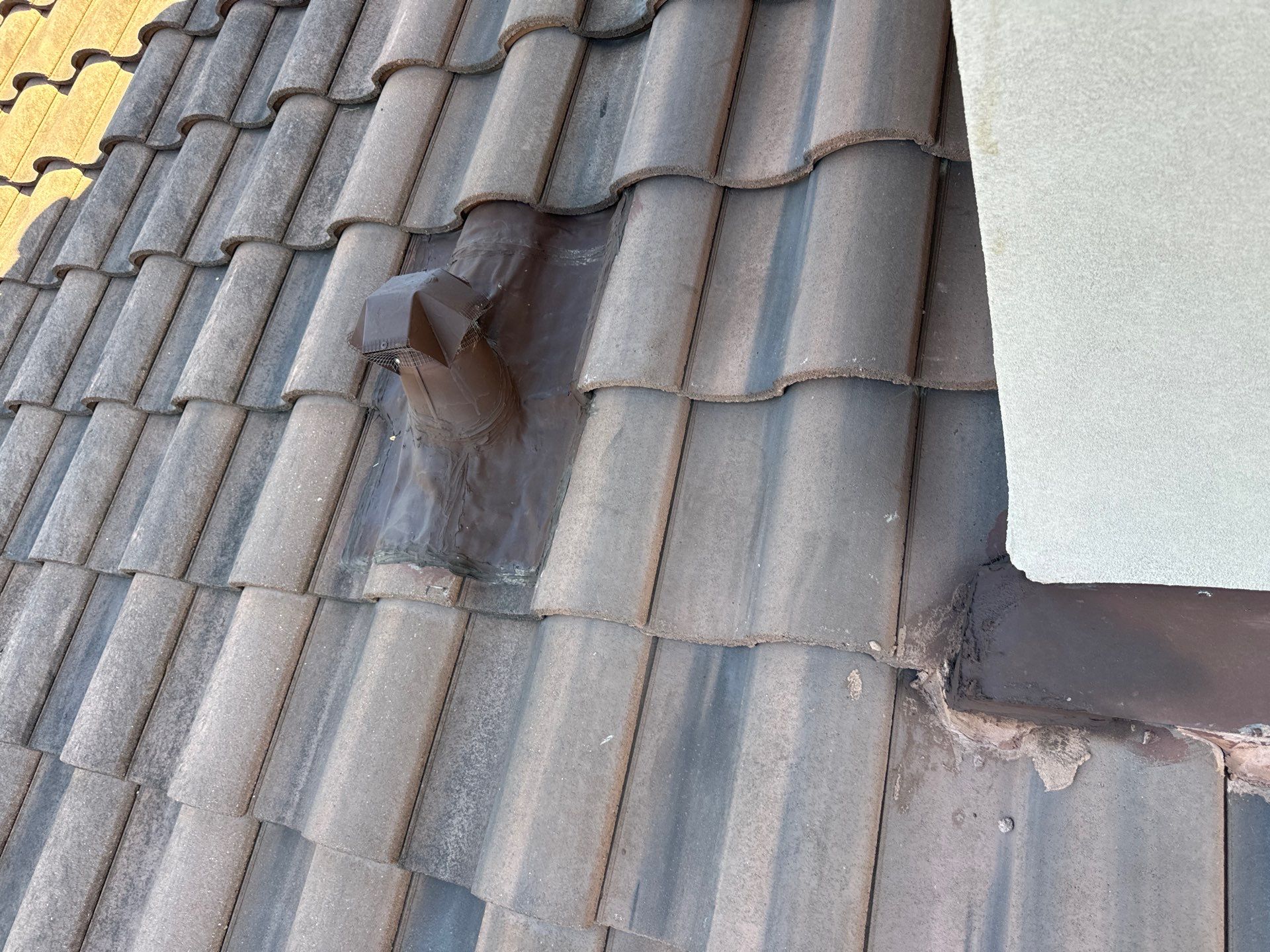 Tile Roof Maintenance  by Associates Roofing Unlimited 