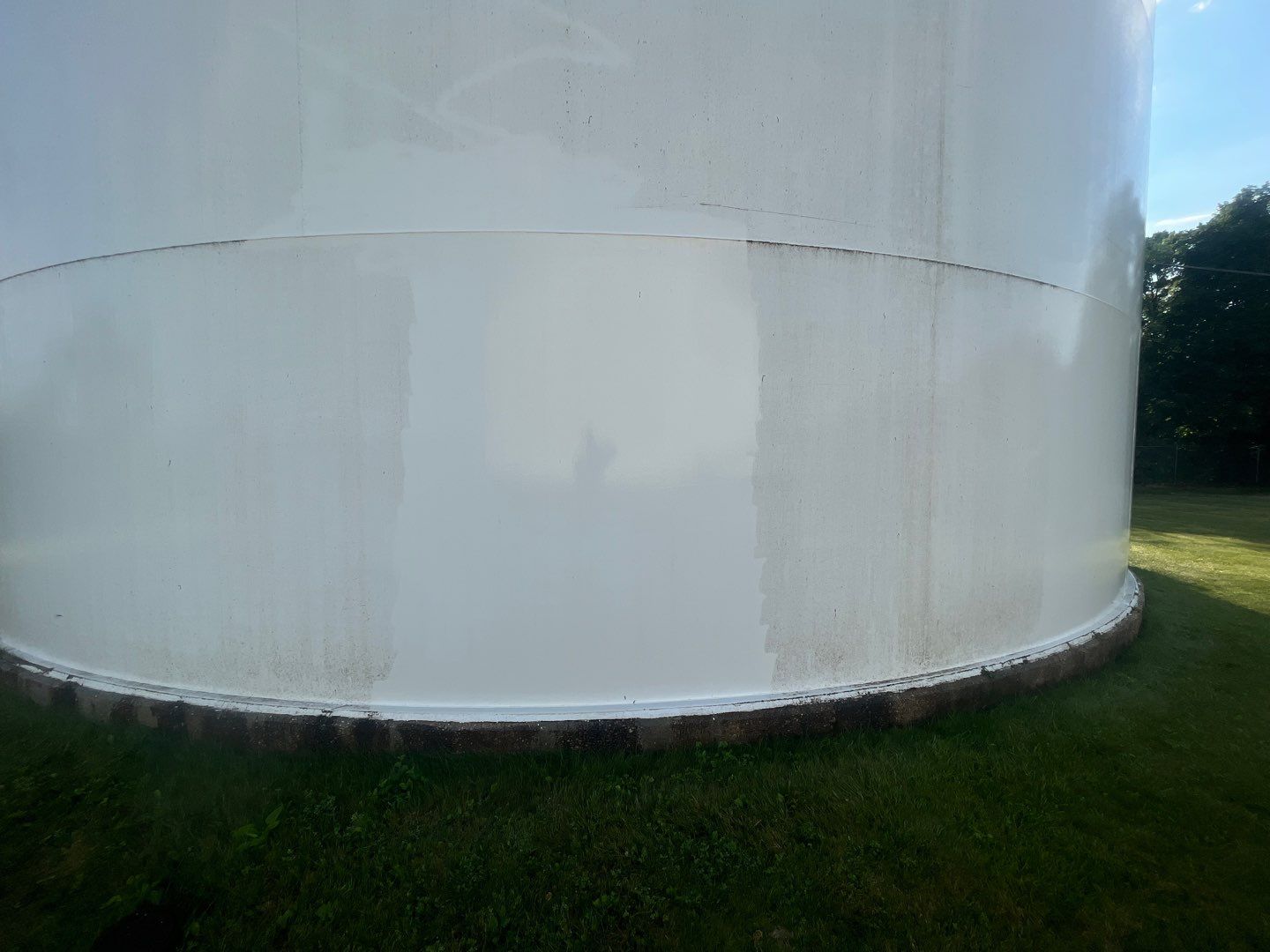 Water tank cleaning by Northern Power Washing LLC.