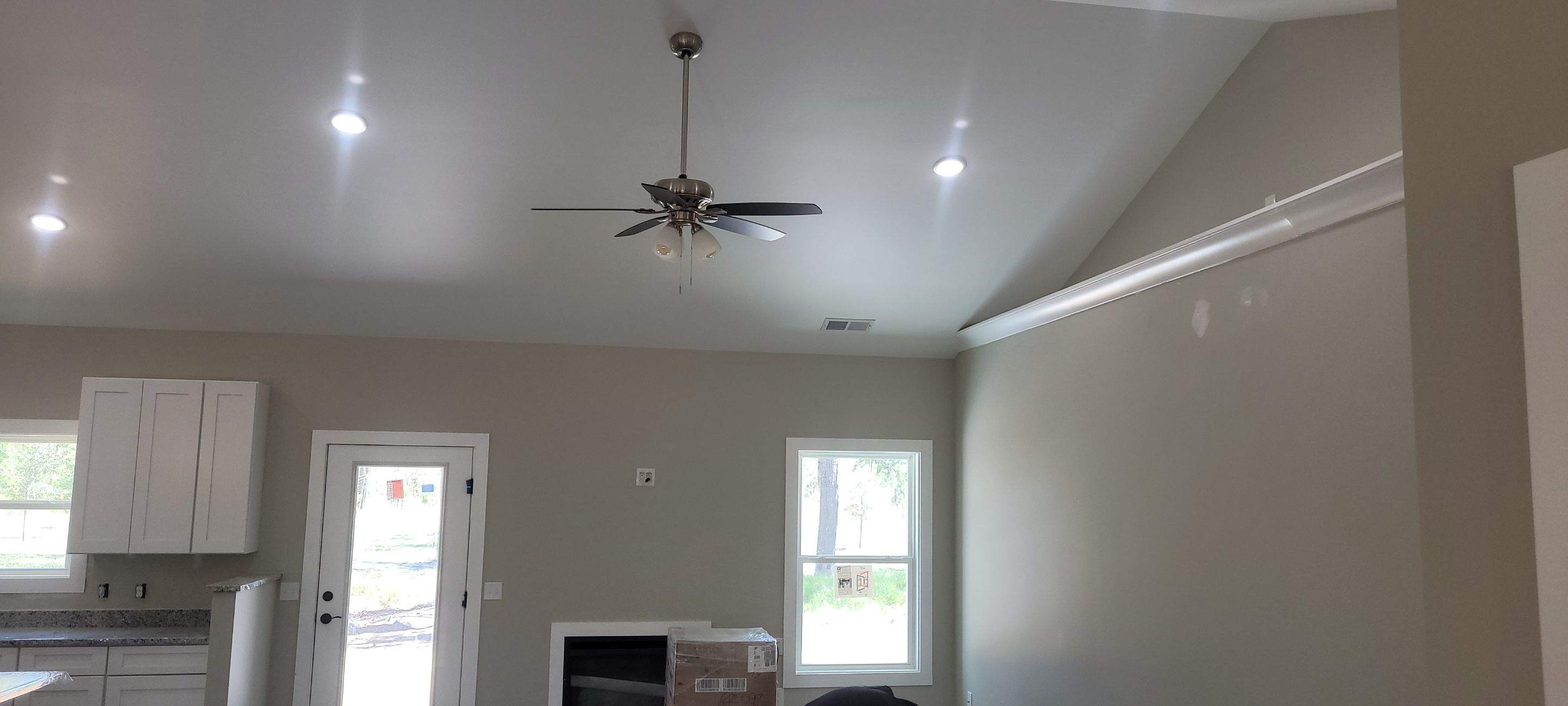 New Home Construction using brick and vertical vinyl by Cornerstone Home Builders, LLC