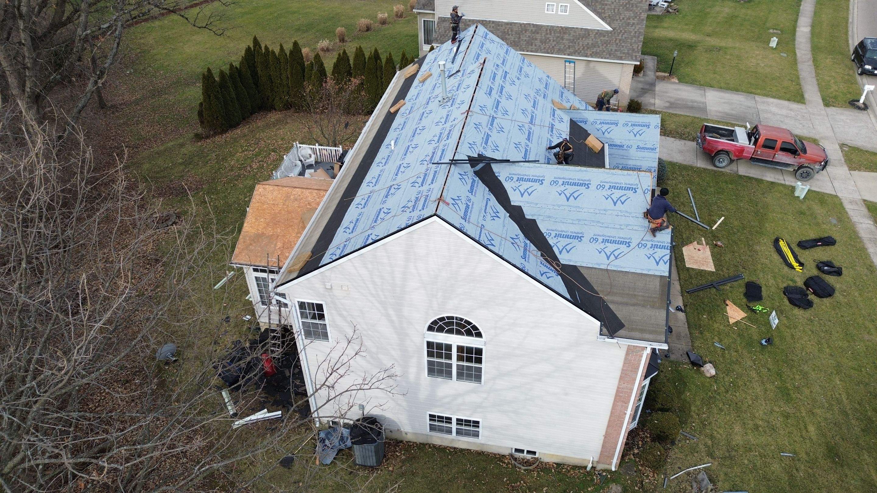 Walden Ponds - Pristine Black and Hydro Flo Gutter Guards by Tamlin Roofing