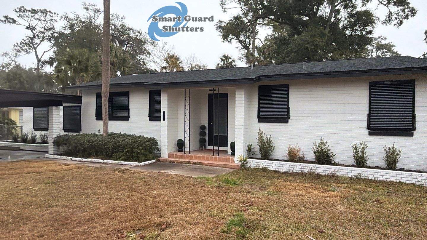 Impact Bahama Shutters in Jet Black by Smart Guard Shutters