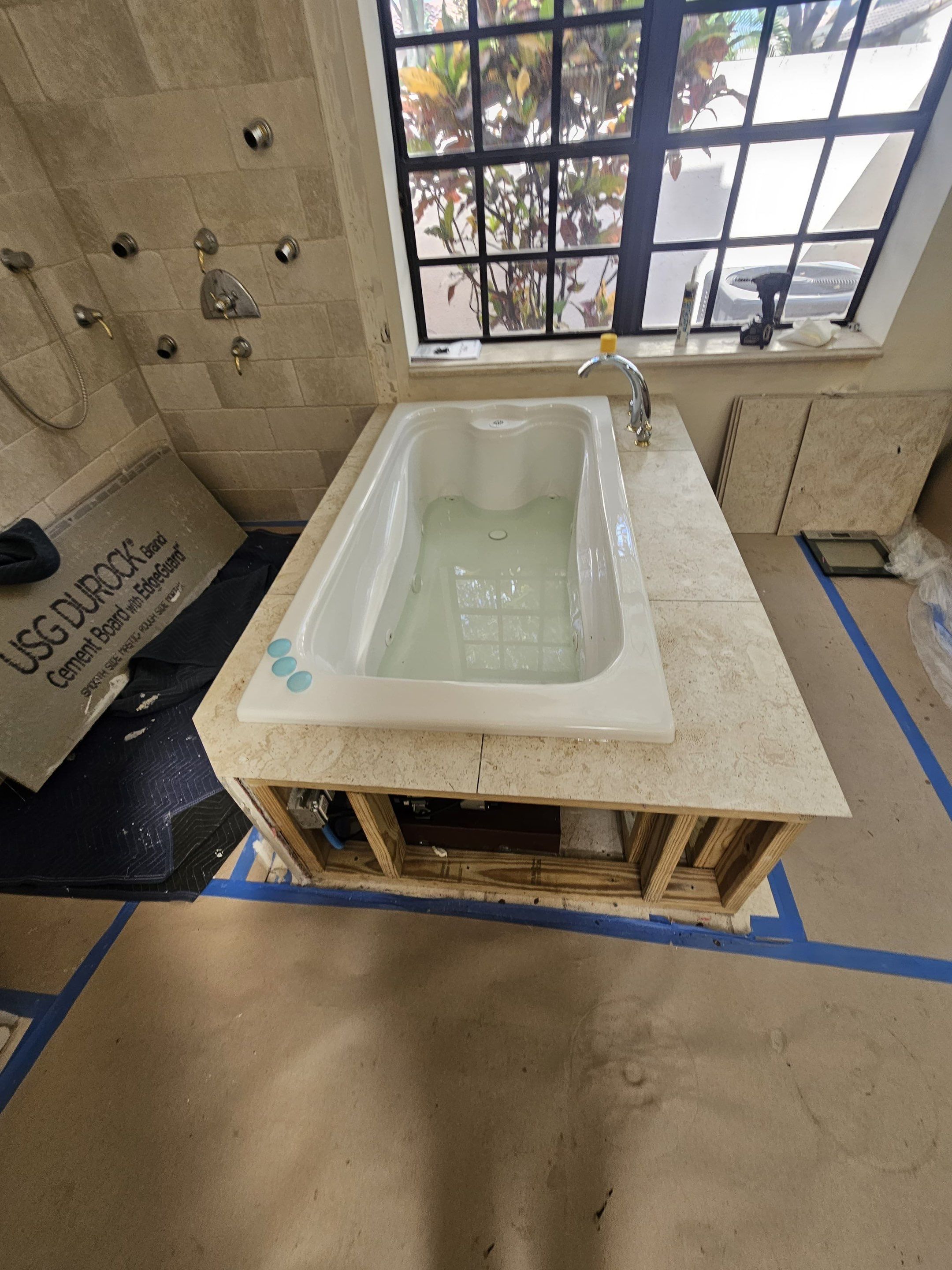 Roman Tub Remodel - Deerfield Beach by Hevi Tile
