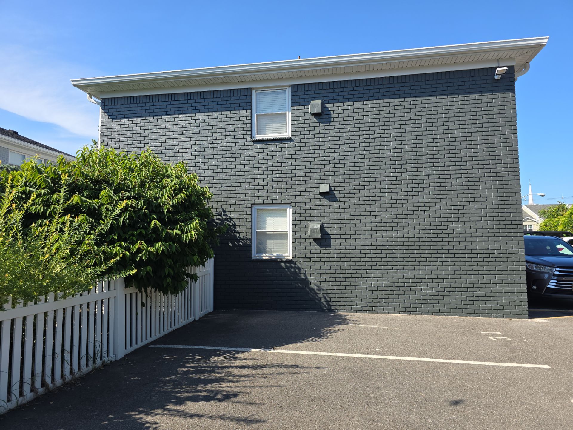 Multi-Unit Apartment Complex Exterior Brick Painting Project in Hackensack by Spectrum Painting, LLC