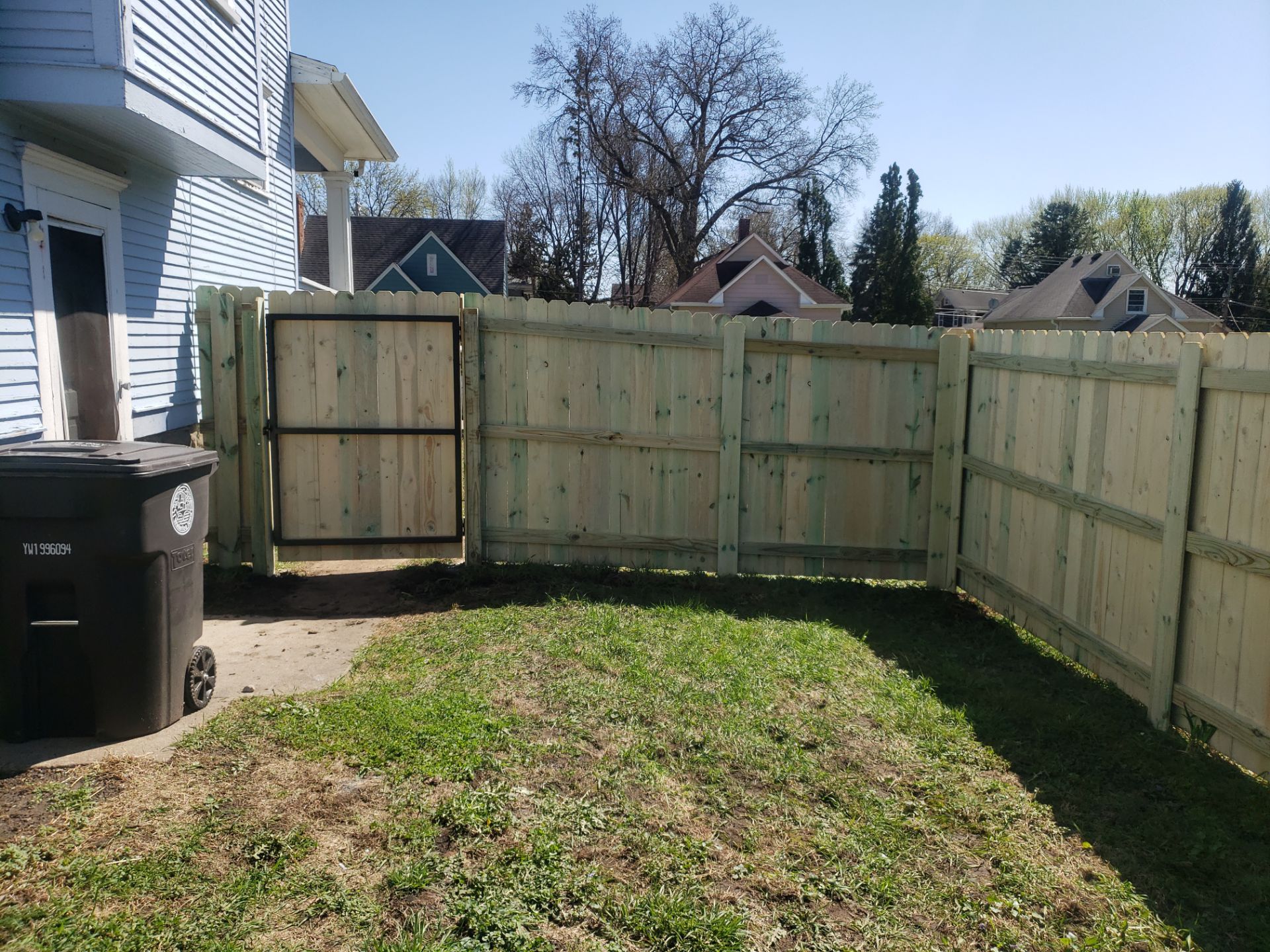 Pressure-Treated Wood Privacy Fence Replacement in Waterloo by Perfect Picket Fence and Stain