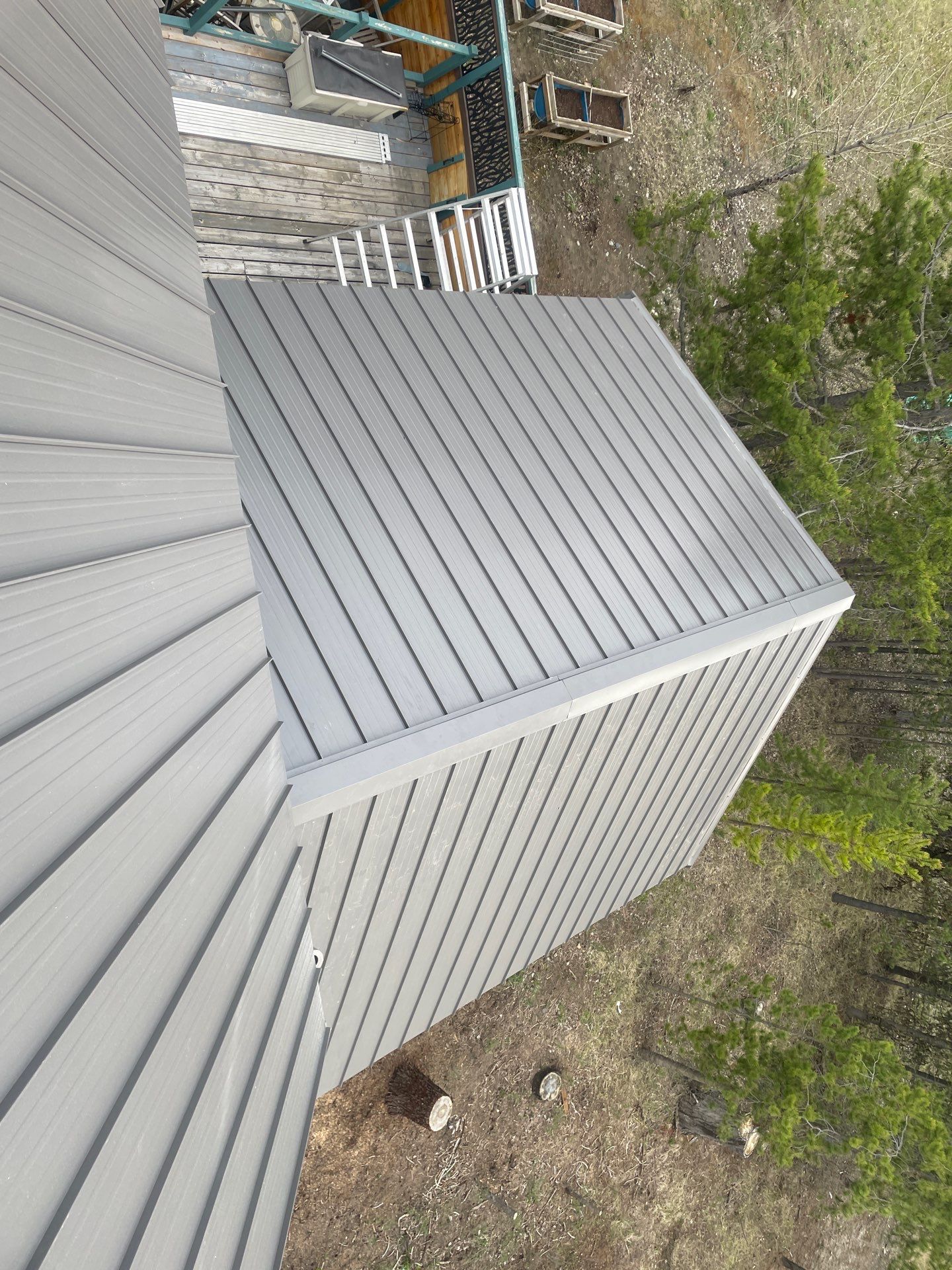 Shingle to Metal Roof Conversion by Top Notch Roofing Inc