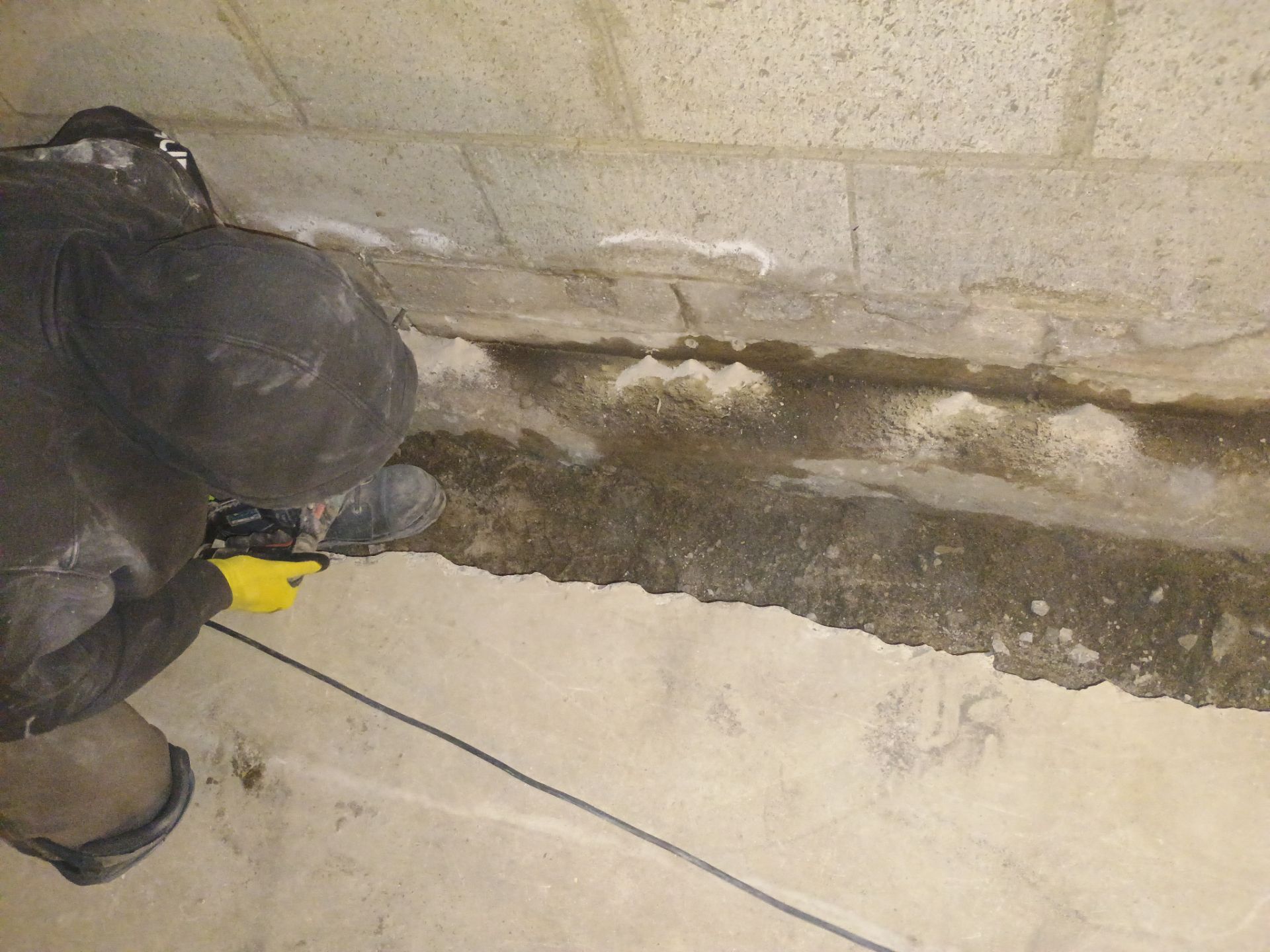 Interior Drain Tile & Buried Discharge in South Minneapolis by Waterproofing Northeast