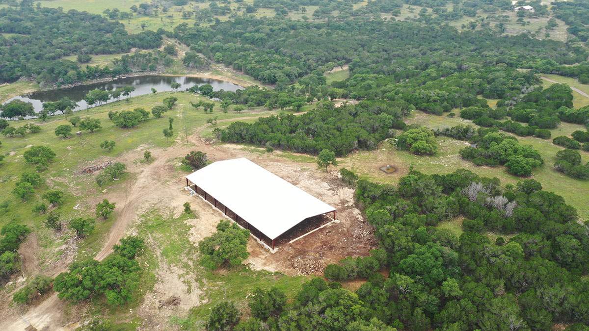 150K Equestrian center with 25K backup tank for potable water. by Hill Country Rain Water