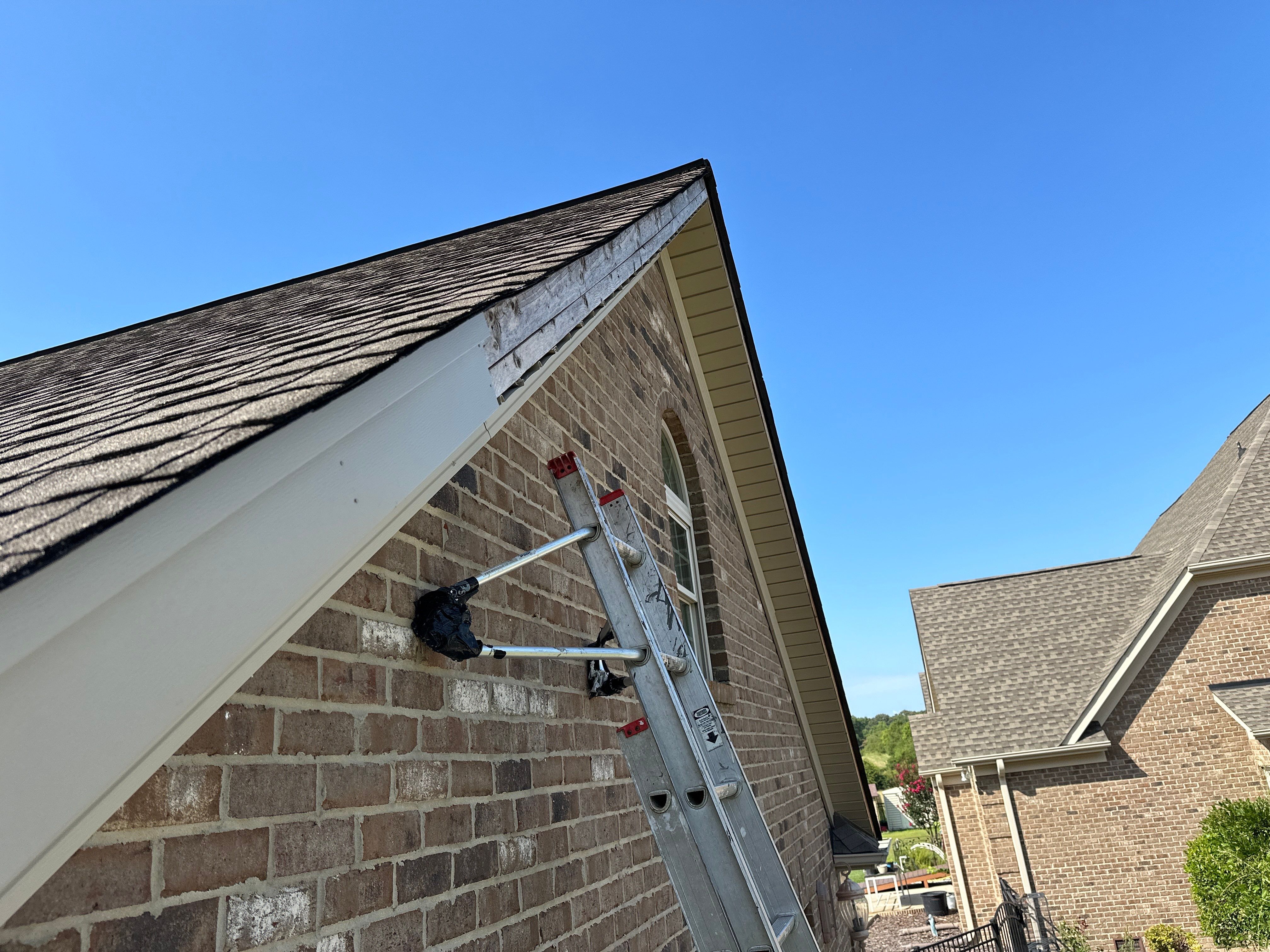 Replacing Wind Damaged Fascia Wrap by New Roof