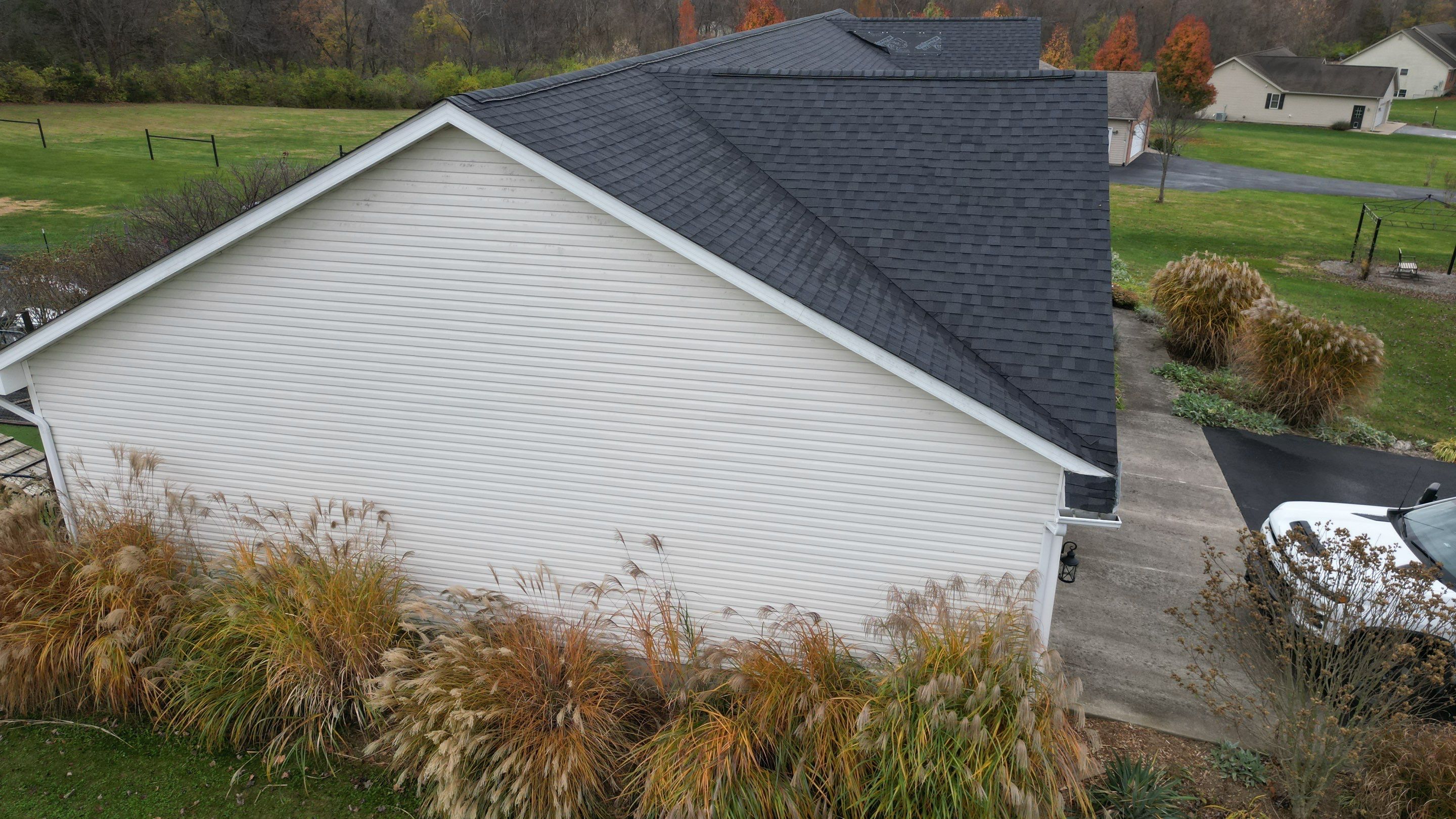 Residential Roofing Installation using Performance Panel Metal - Frost Black by RoofX 