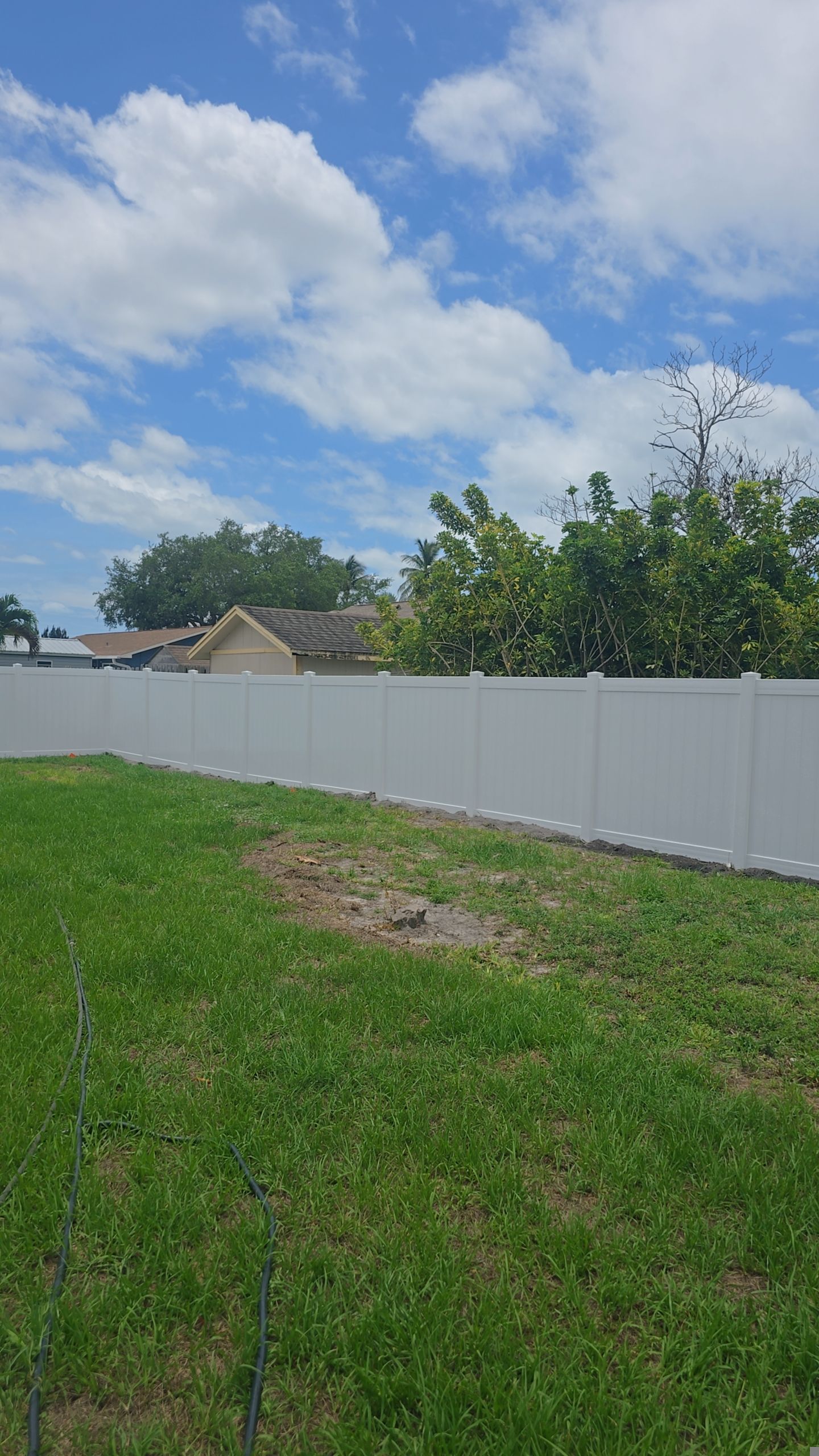 White Vinyl Privacy Fence Installation in Bonita Springs by True Fence LLC