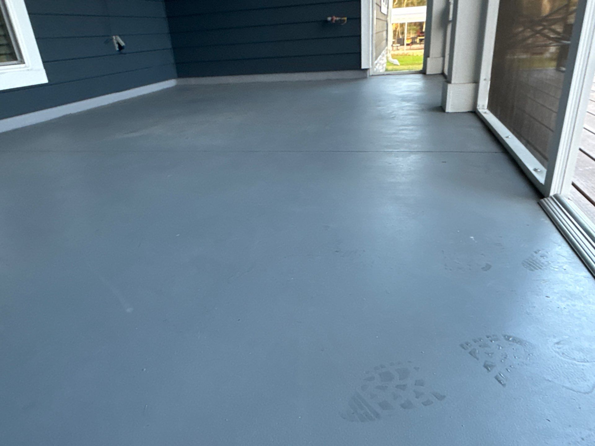 Front and Back Porches in Chiefland, FL in Pebble Beach by Cross Creek Concrete Coatings