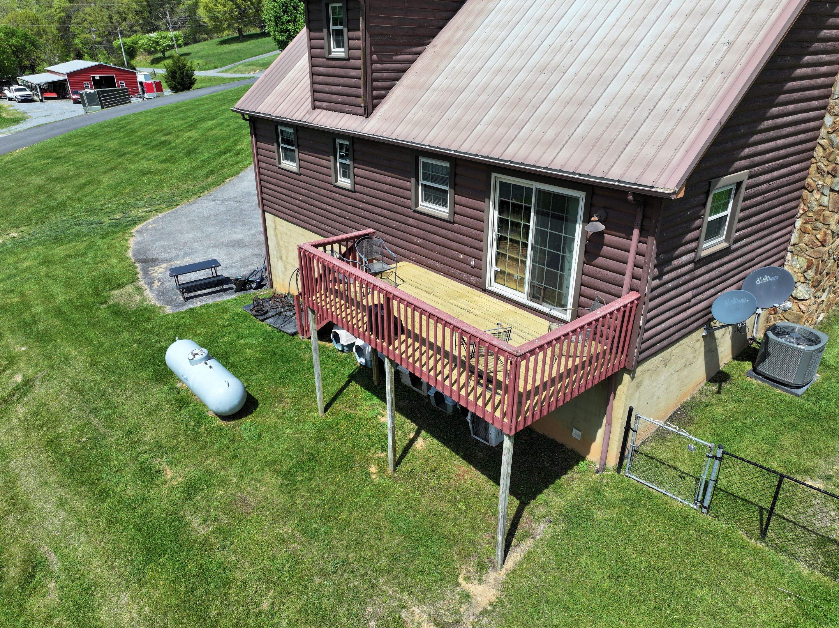 Paddle Creek Pet Ranch Cabin  by Omnia Roofing