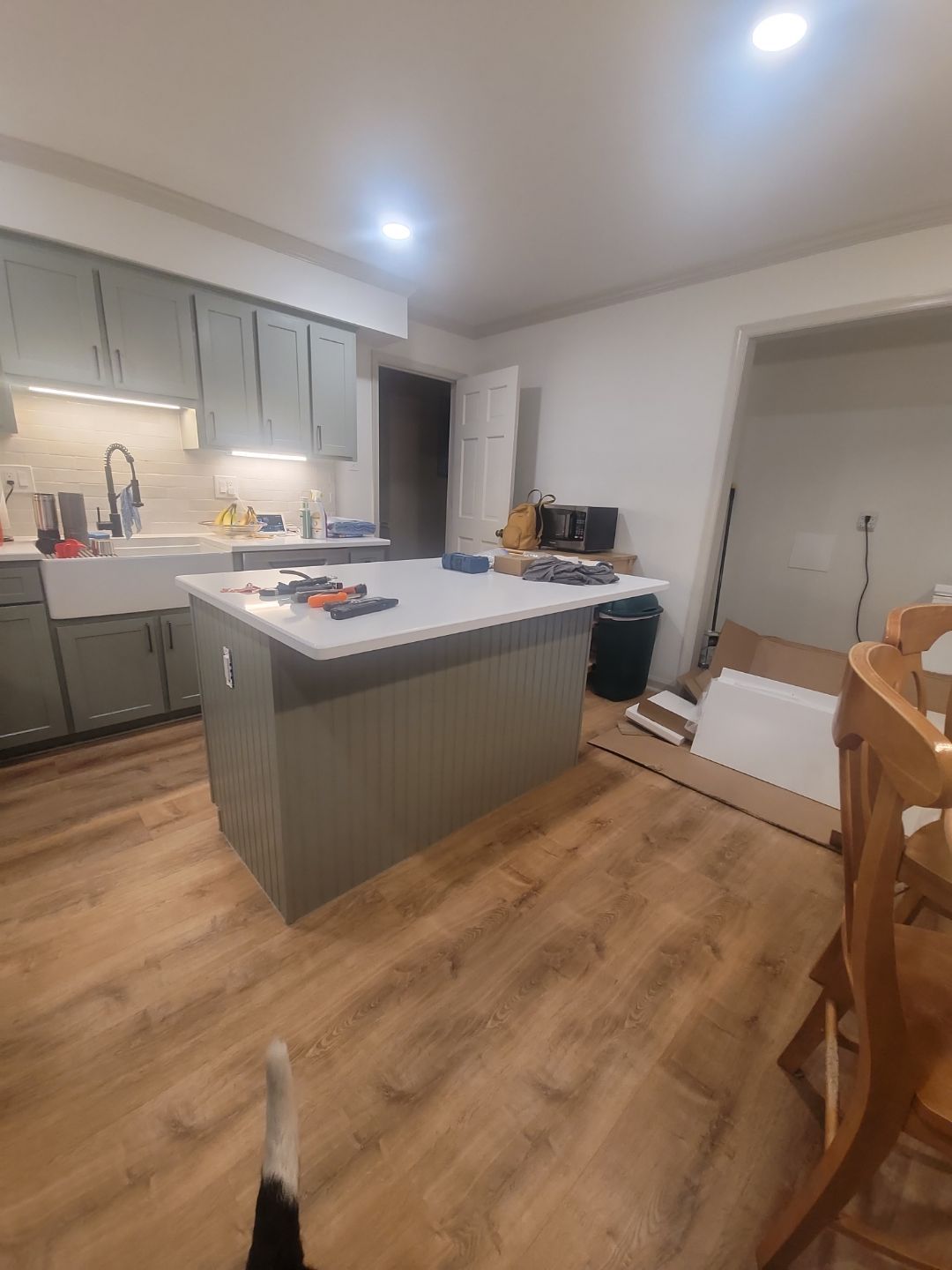 A Pathway to Personality – A Two-Tone Kitchen Transformation in Apex by Elite Remodeling and Design LLC