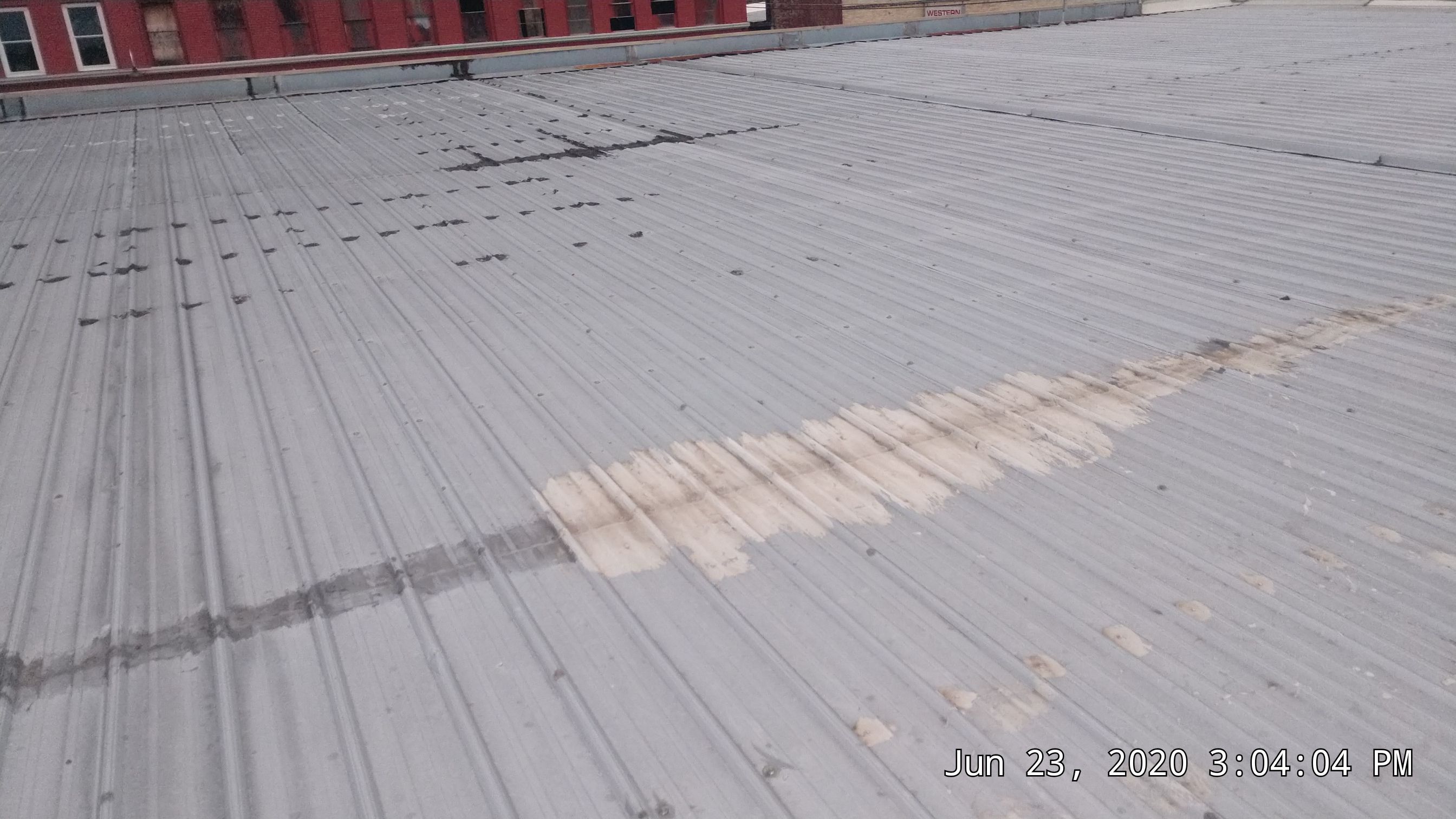 Commercial Metal Restoration System using Aldocoat Coatings by Hostetler Roofing