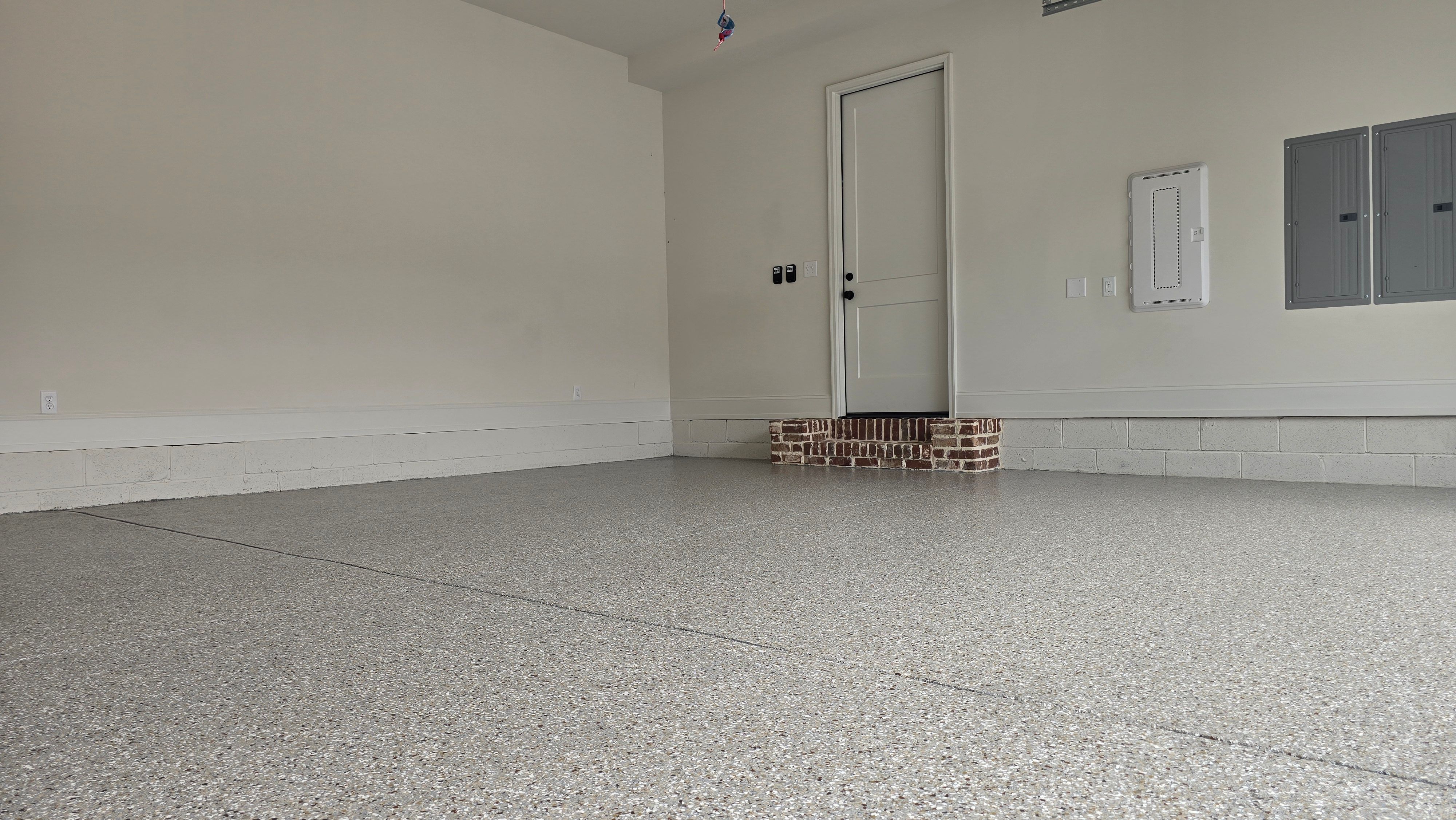 Garage Using Creekbed  by Elite Floor Solutions