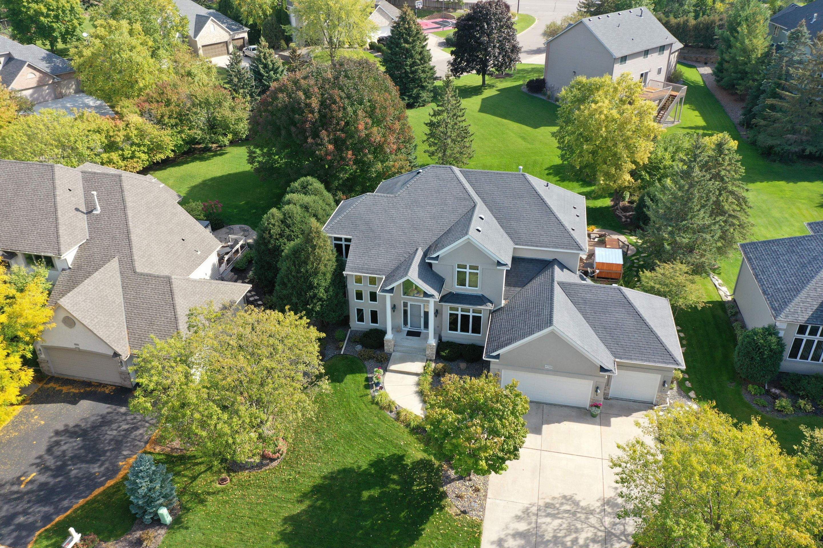 Residential Roofing Installation using Certainteed Landmark Moire Black by MODERN EXTERIOR SYSTEMS