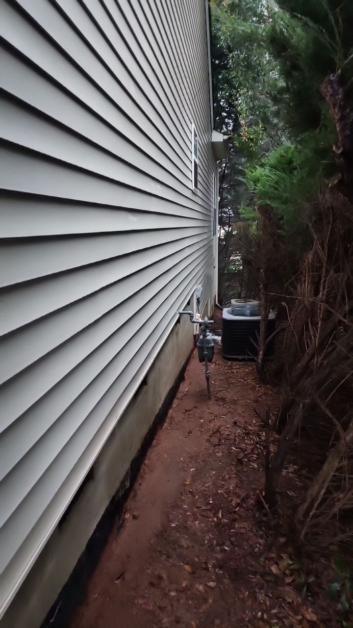 House Wash using cleaner by Power Wash Masters LLC