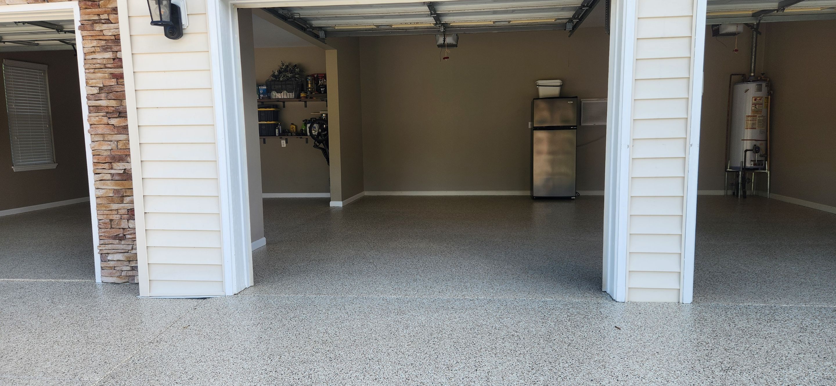 Incredible transformation on Driveway Garage and Sidewalk! by Elite Floor Solutions