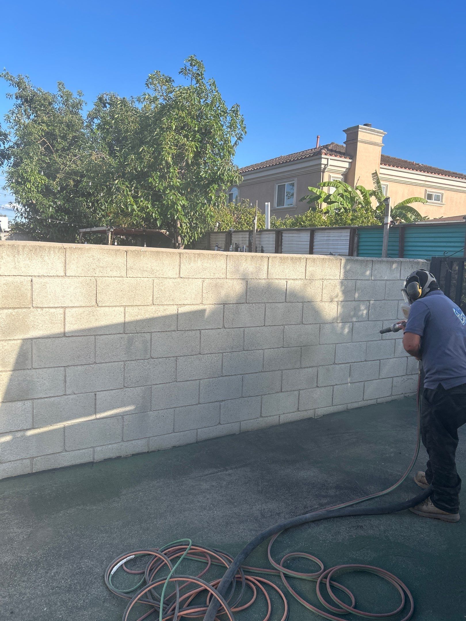Sandblasting Graffiti Off Brick Wall In Downey, CA by La Power Washing Inc 