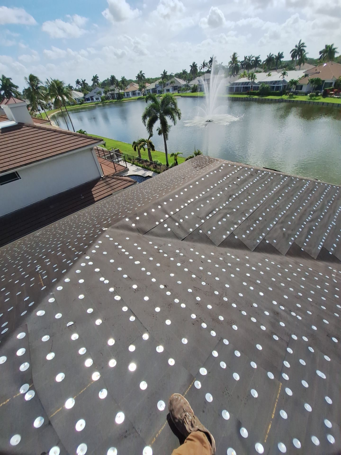 Residential Roofing Installation using 1" Nail strip metal roof by BLUES BROTHERS ROOFING