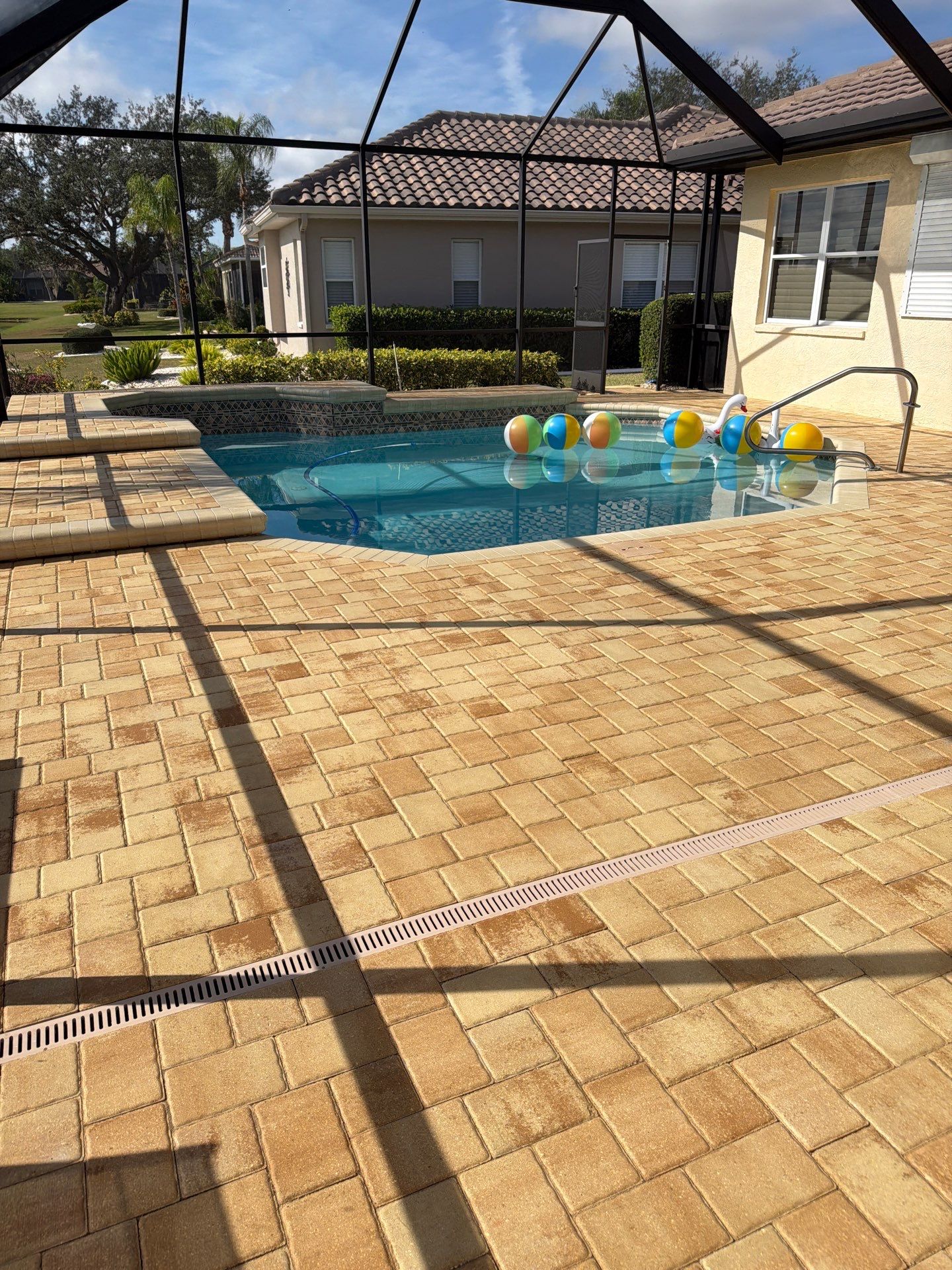 Custom Tan Paver Pool Deck and Patio in Sun City Center by Supreme Paver Experts