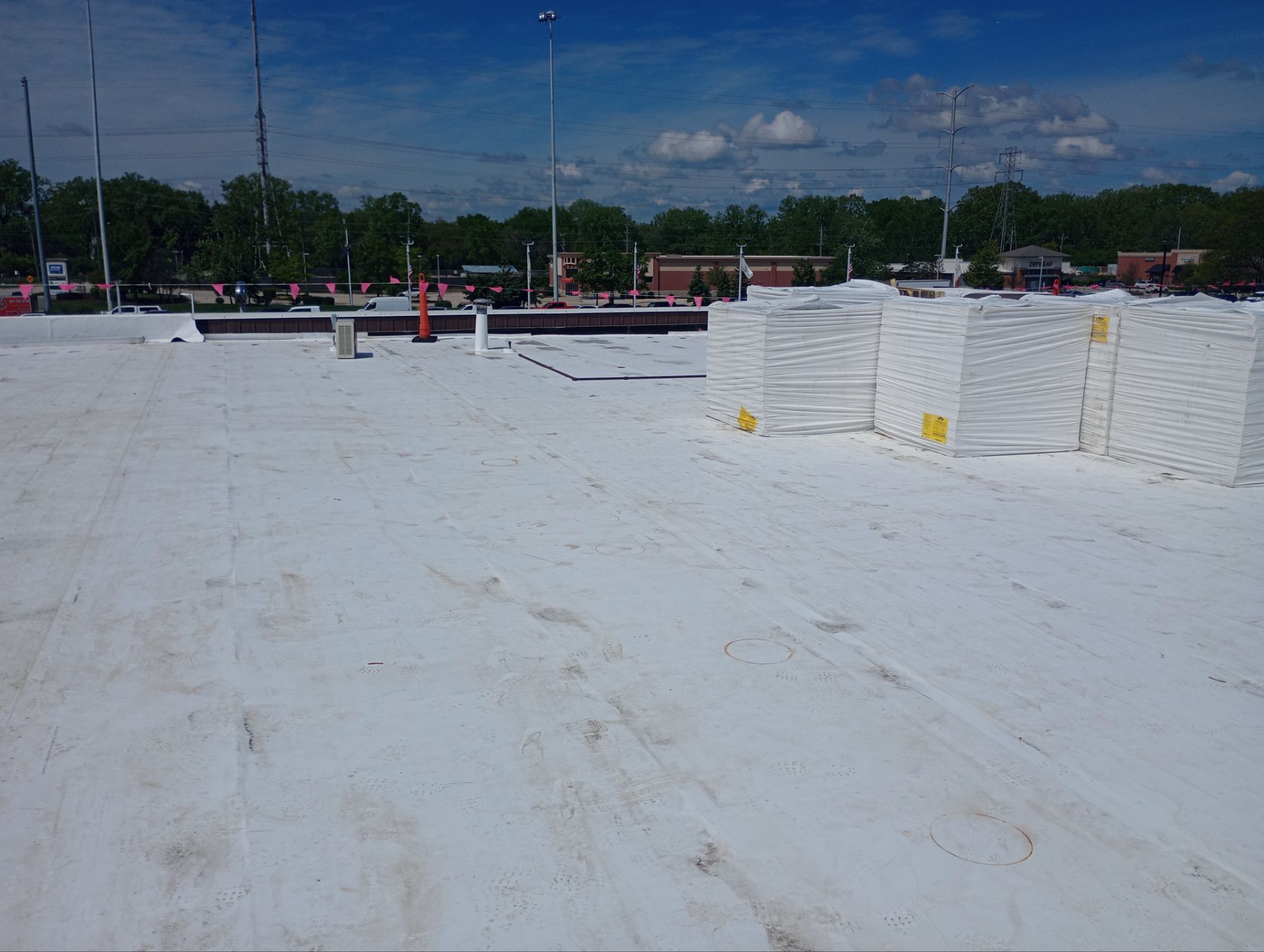 Ford Dealership - Re-Roof by Pink Roofing